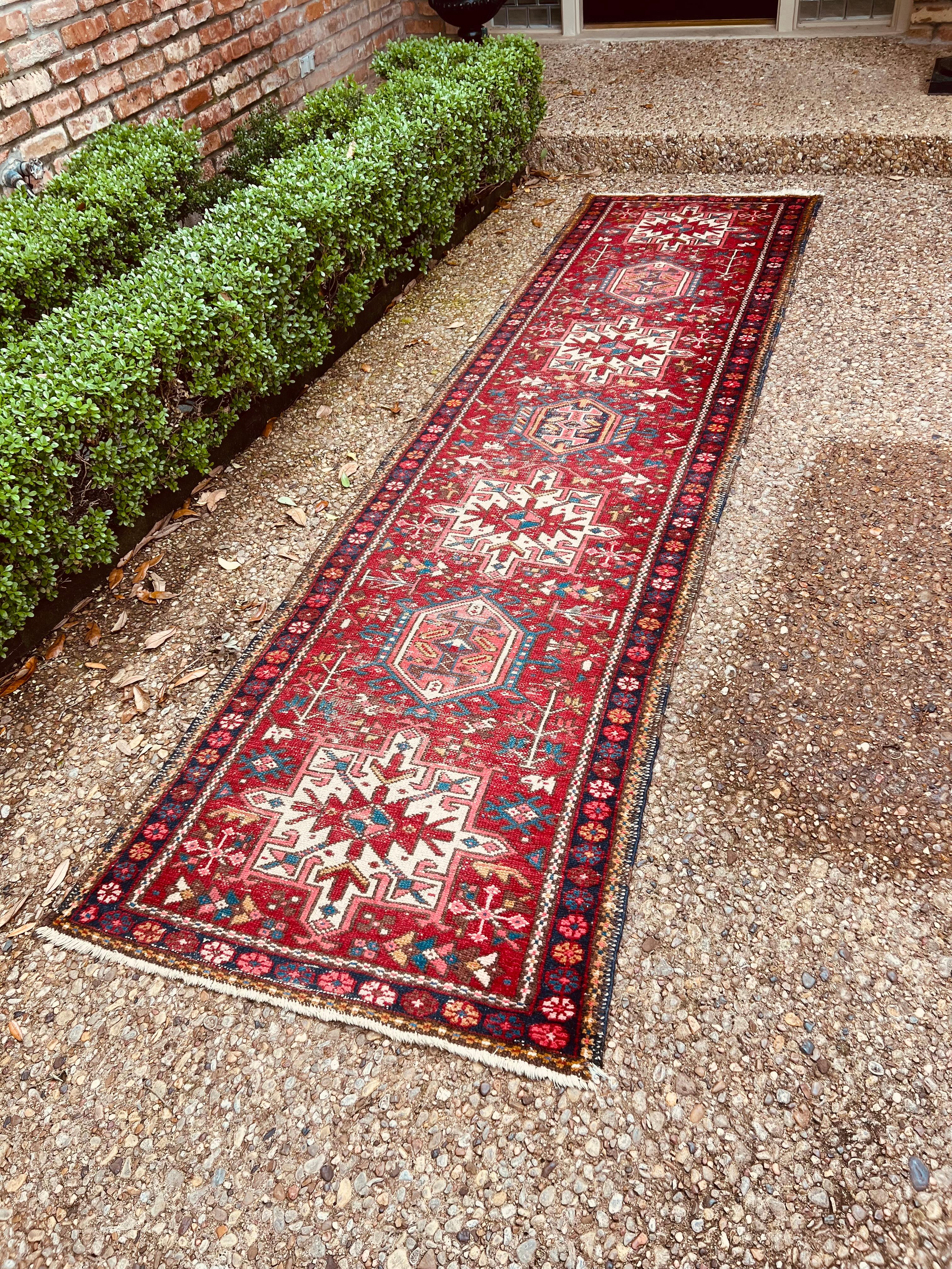 Heriz Rugs, known for their durability and longevity are considered one of the most highly coveted Persian village carpet styles.  They are known for their distinctive geometric patterns, bold colors and large scale motifs.  This rug shows slight