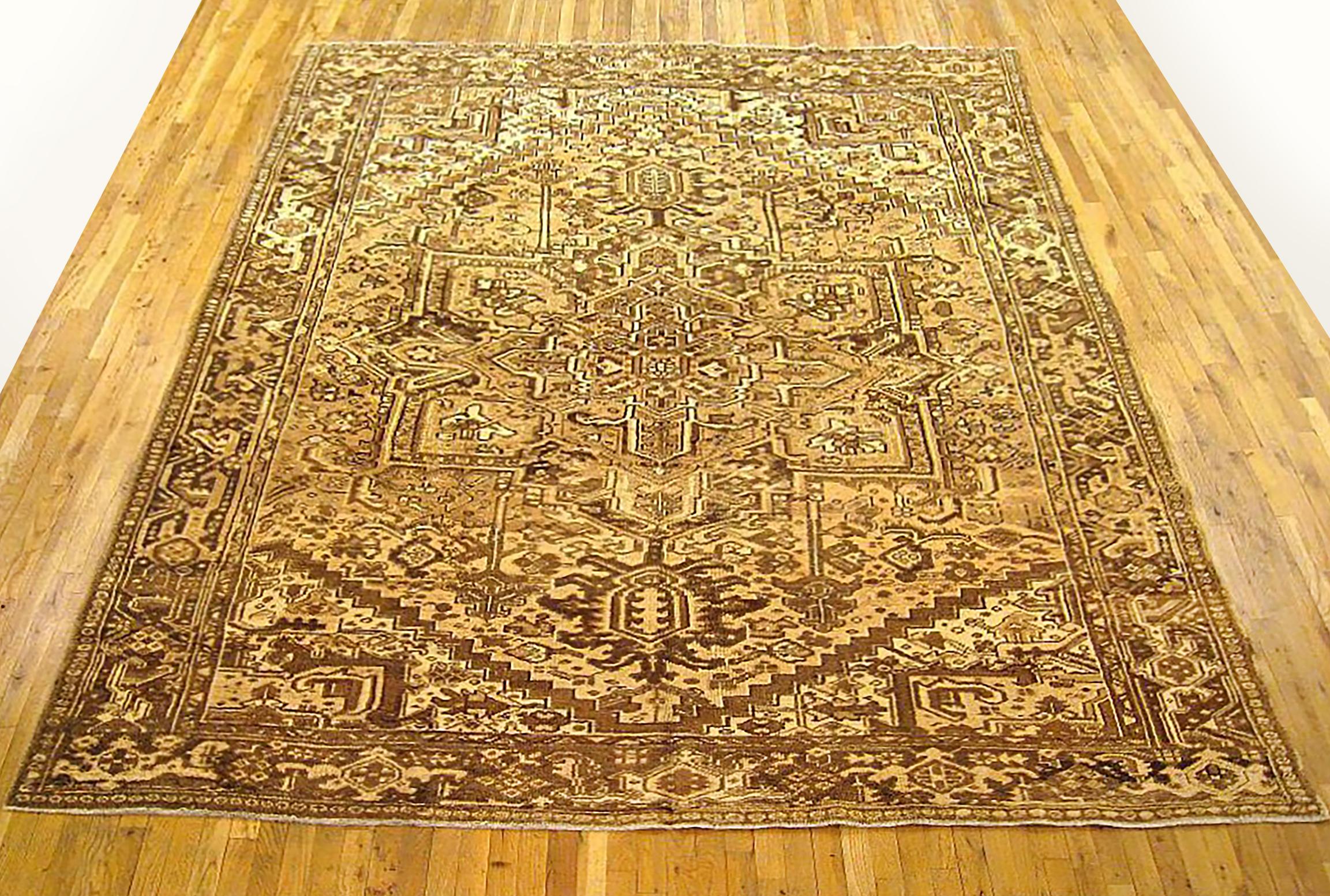 Vintage Persian Heriz Oriental rug, Room size

A vintage Persian Heriz oriental rug, size 11'2
