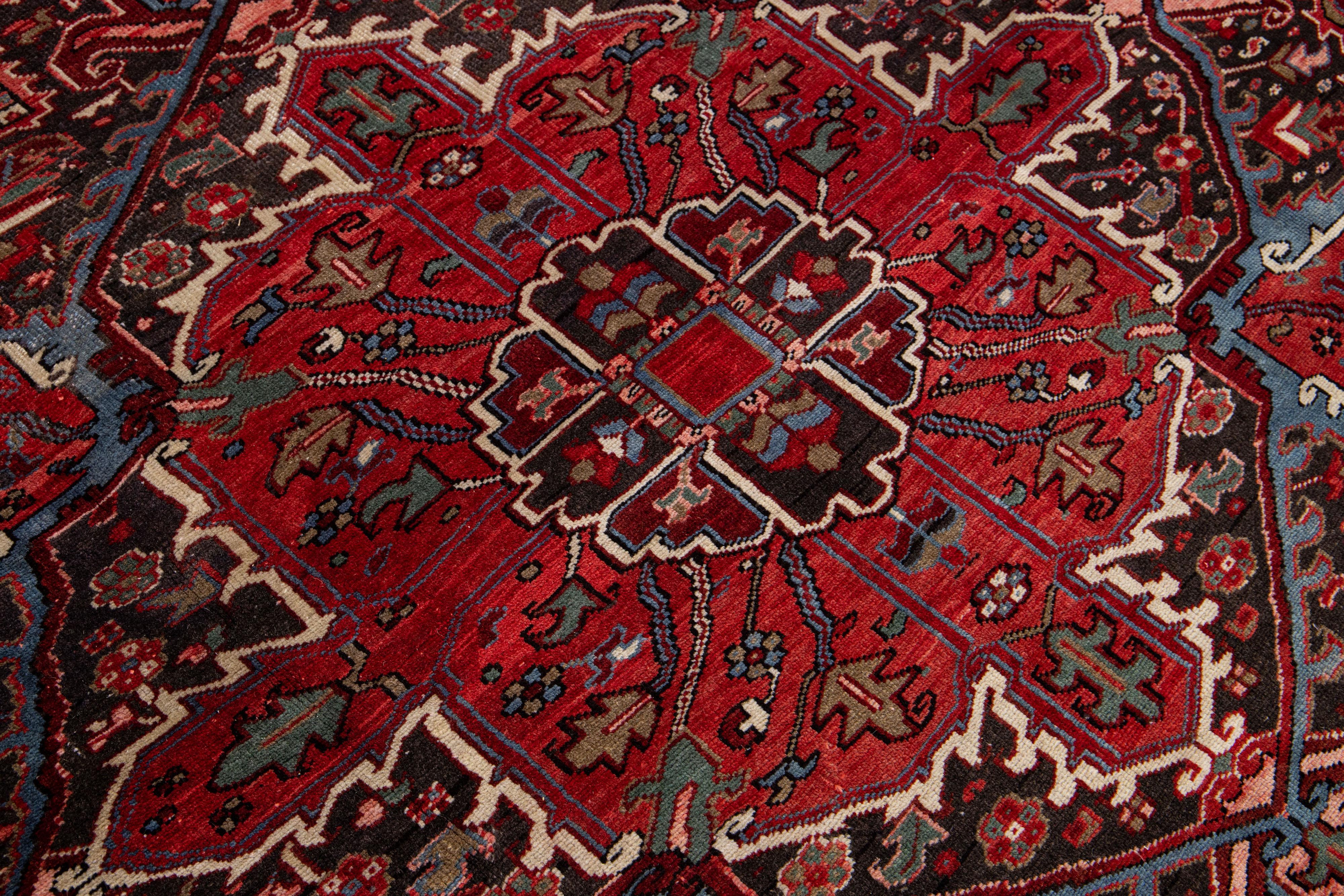 Mid-20th Century Vintage Persian Heriz Red Handmade Medallion Wool Rug For Sale