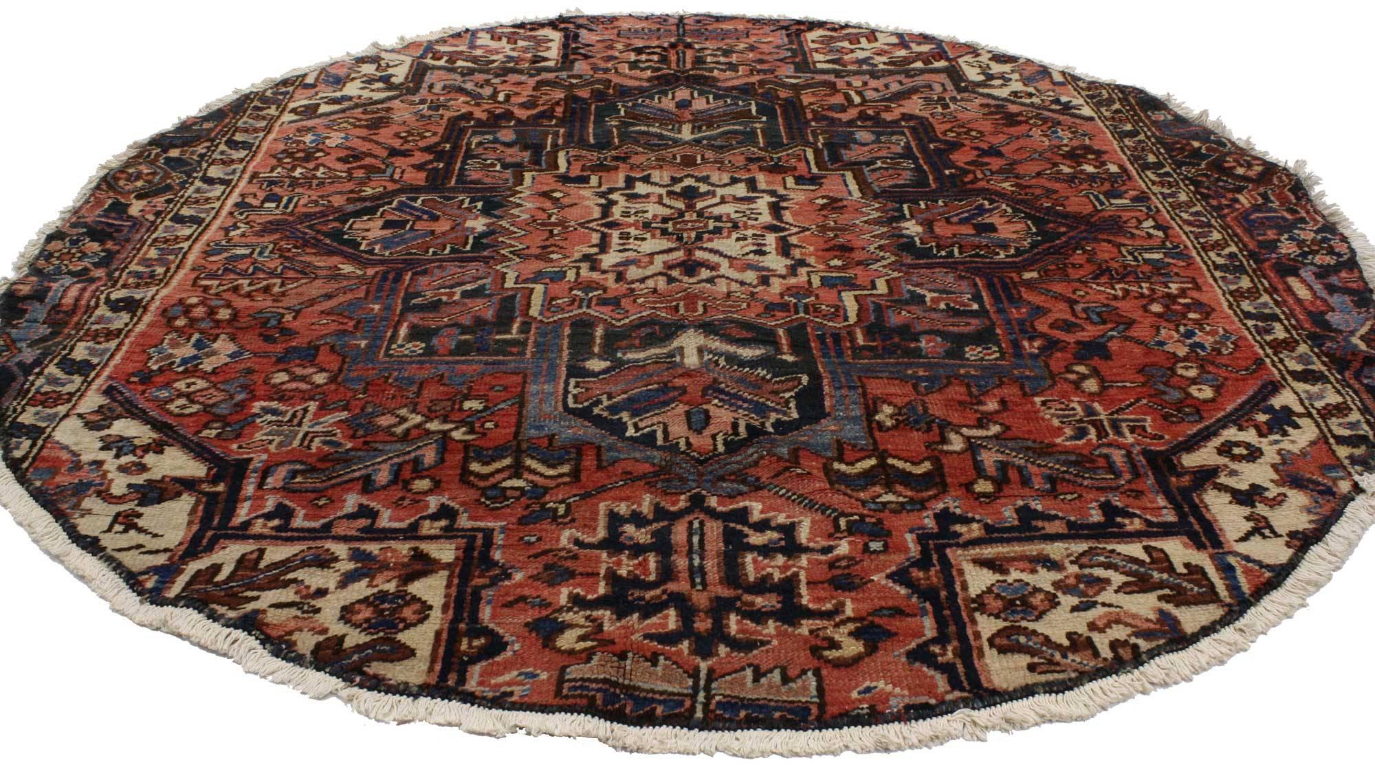 75307, vintage Persian Heriz round rug with traditional style. This hand-knotted wool vintage Persian Heriz round rug with traditional style features a centre lobed medallion and cut-out centre field. Only two side borders appear along both sides