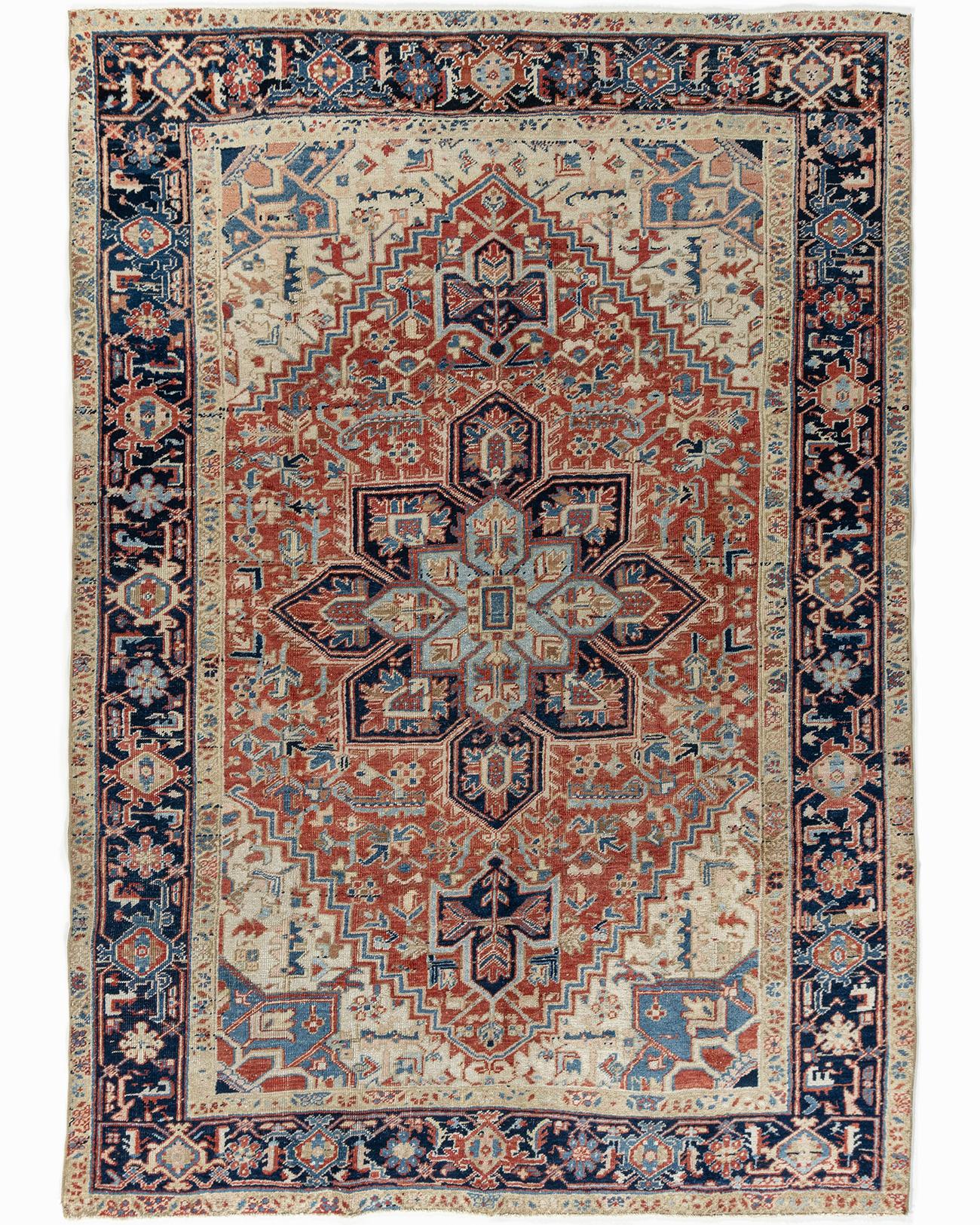 Vintage Persian Heriz rug 6'5 x 9'. As perpetually fashionable as they are collectible, traditional Heriz luxury handmade rugs are skillfully woven in vibrant colors and emphatic geometric designs. The Heriz district of NW Persia has been weaving
