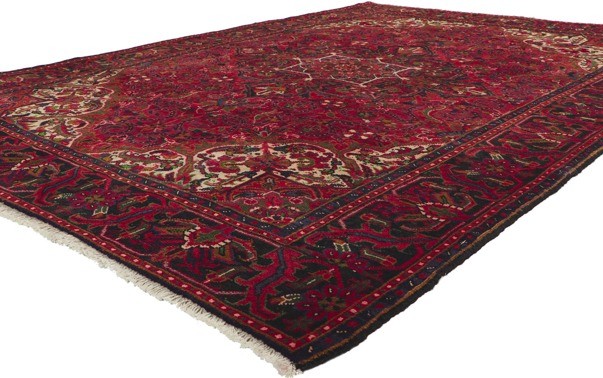 61042 Vintage Persian Heriz Rug 06'09 x 09'04.
Warm and inviting with timeless style, this hand-knotted wool vintage Persian Heriz rug is a captivating vision of woven beauty. The composition features an concentric lozenge and octofoil medallion