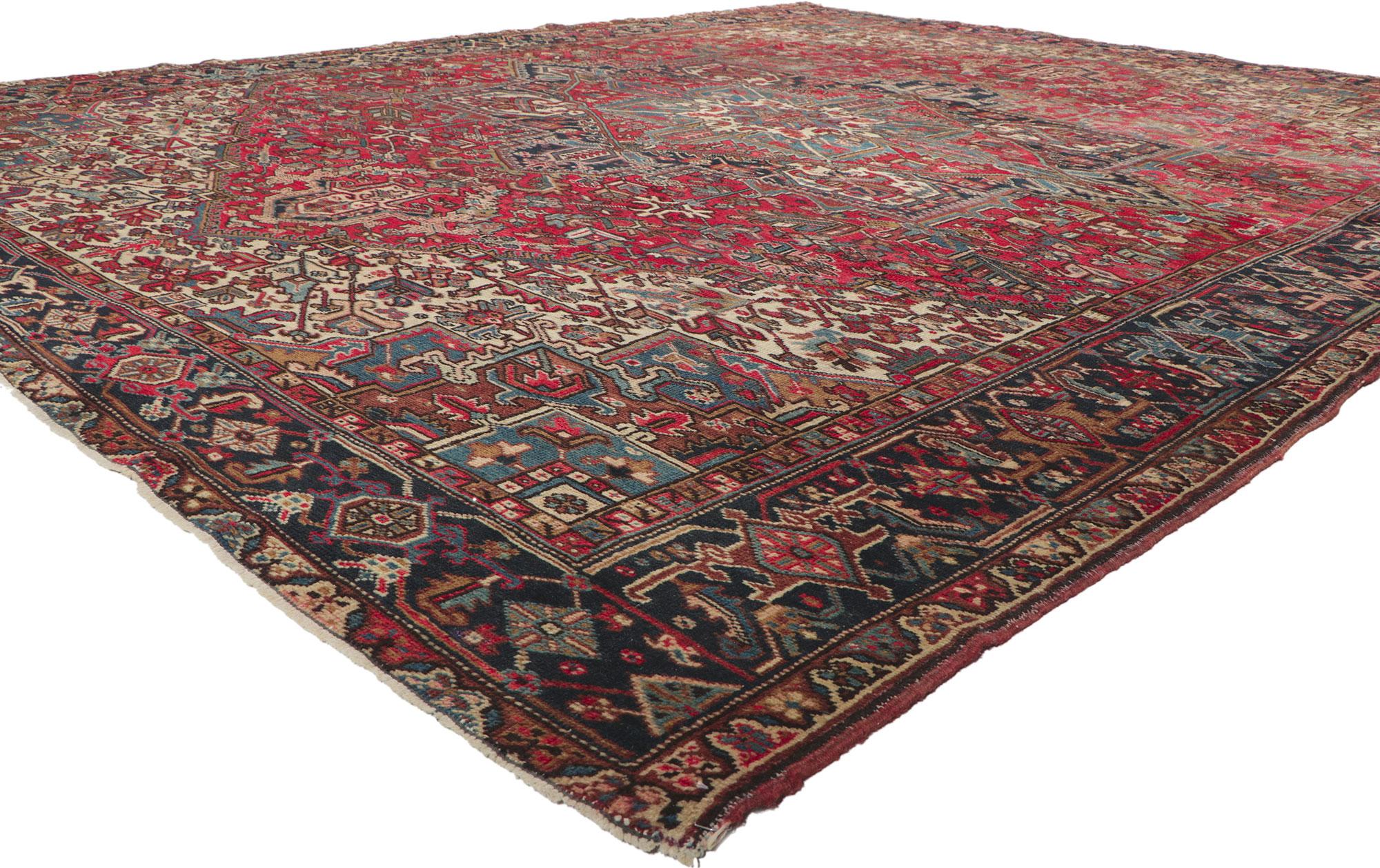 ?78349 Vintage Persian Heriz Rug, 09'08 x 12'02. Emanating timeless style with incredible detail and texture, this hand knotted wool vintage Persian Heriz rug is a captivating vision of woven beauty. The geometric design and sophisticated color