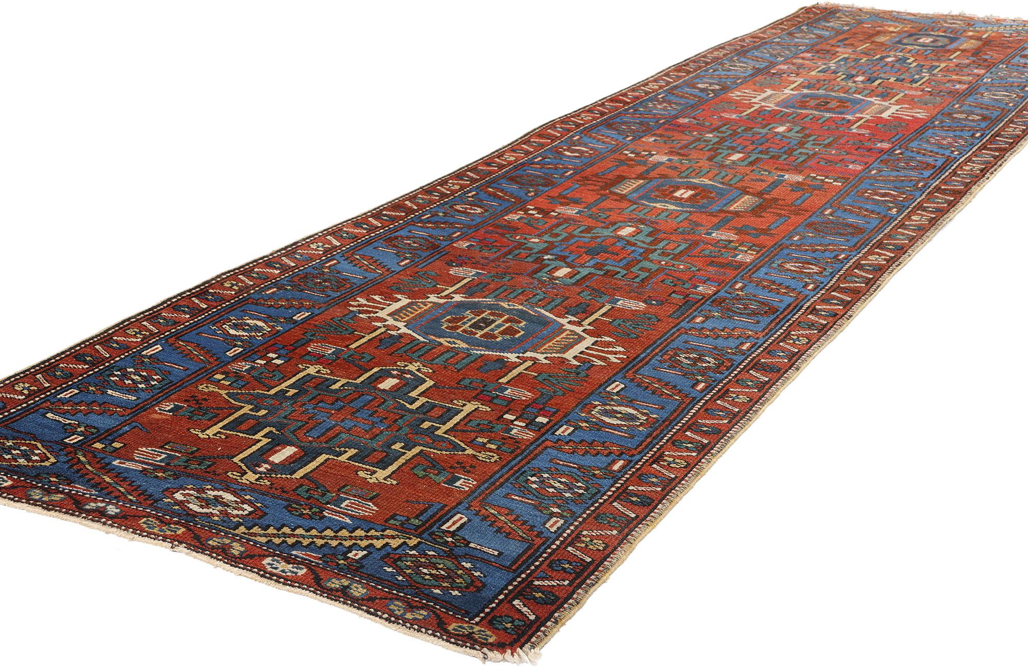78955 Vintage Persian Karaja Heriz Rug Runner, 03'02 x 10'02. This hand-knotted wool vintage Persian Karaja Heriz runner exudes timeless elegance with its sophisticated interplay of geometric motifs and vibrant hues. Originating from the village of