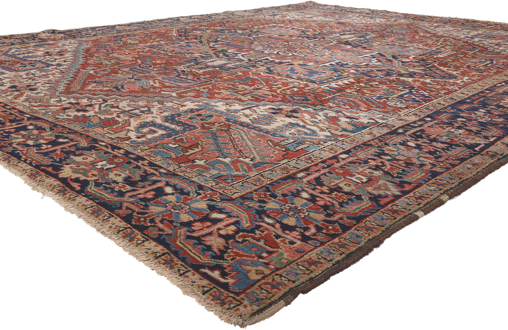 76648 Vintage Persian Heriz Rug, 09'07 x 12'04. 
Perpetually posh meets timeless appeal in this hand knotted wool vintage Persian Heriz rug. The stylish levels of complexity and traditional color palette woven into this piece work together creating