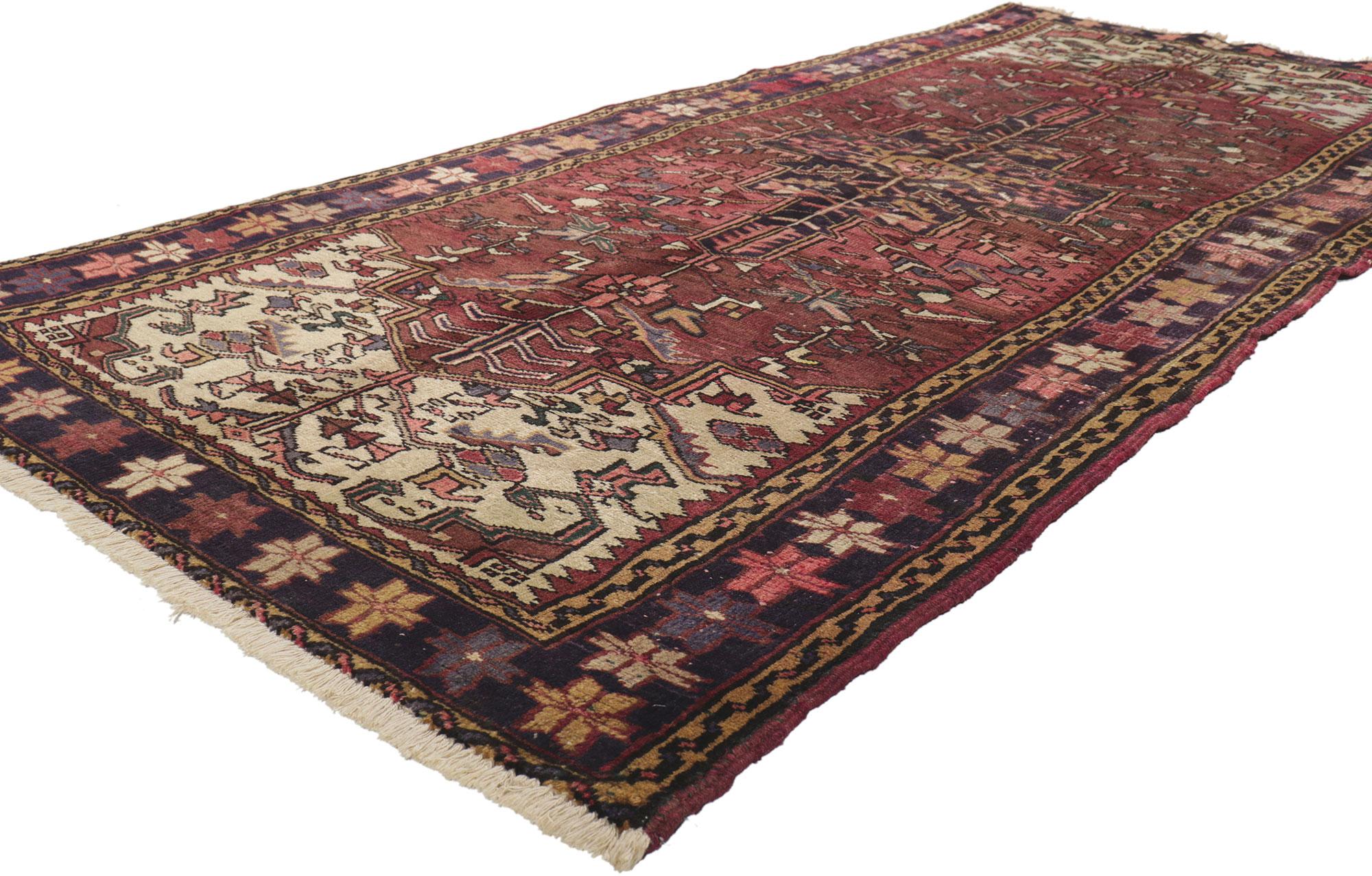 76745 Vintage Persian Heriz Rug Runner, 03'08 x 08'04.
Emanating timeless style with incredible detail and texture, this hand-knotted wool vintage Persian Heriz rug is a captivating vision of woven beauty. The geometric design and earthy colorway