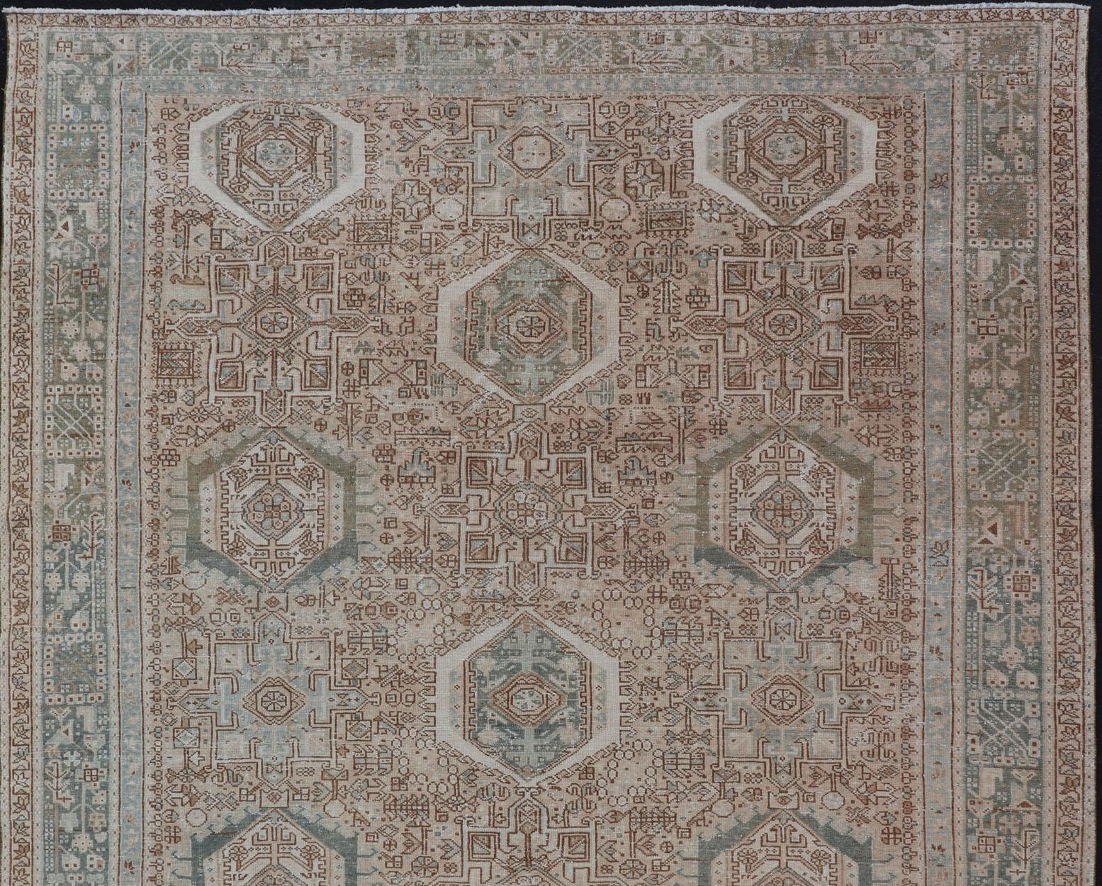Hand-Knotted Vintage Persian Heriz Rug with All-Over Medallion Design in Tan and Blues For Sale