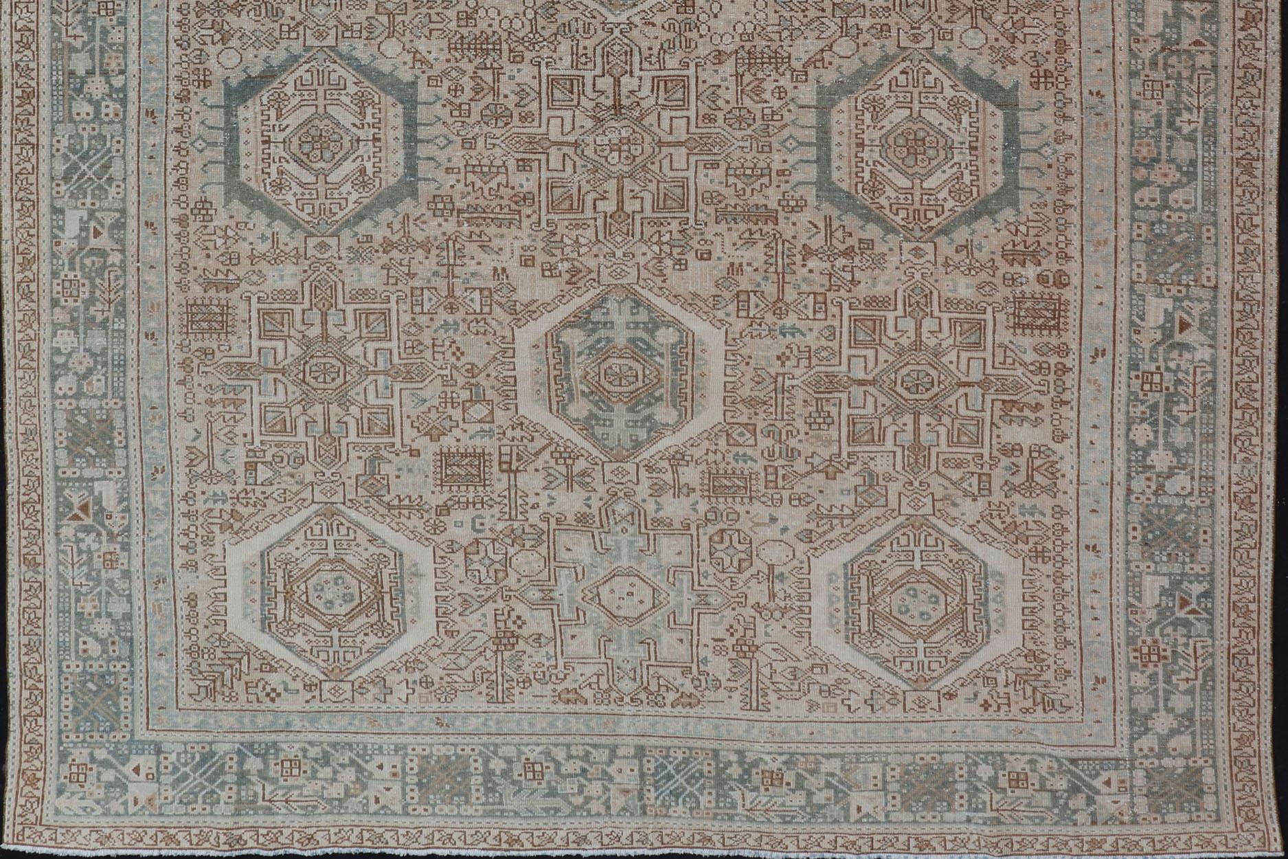 20th Century Vintage Persian Heriz Rug with All-Over Medallion Design in Tan and Blues For Sale