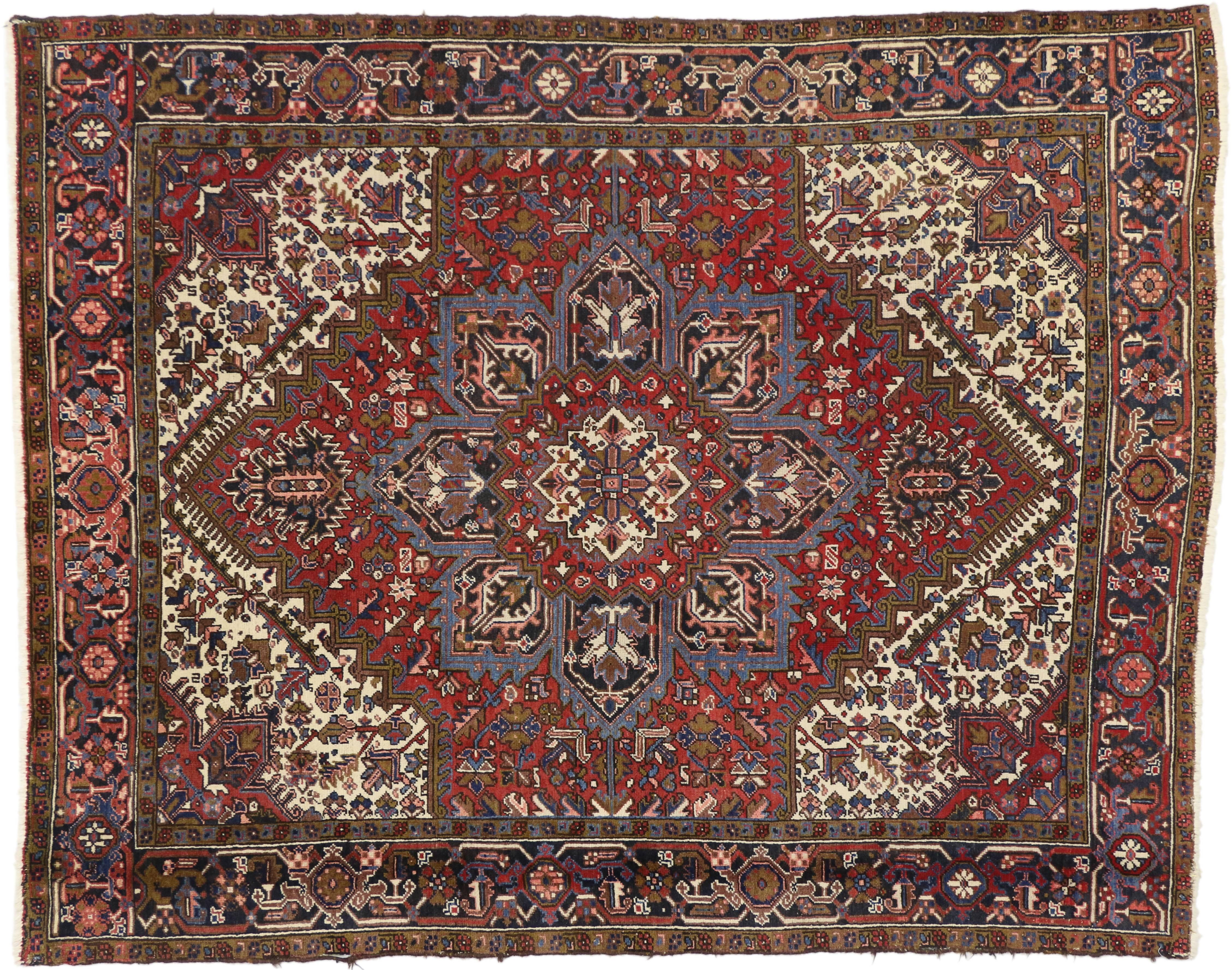 74698 Vintage Persian Heriz Rug with Mid-Century Modern Style in Traditional Colors. This vintage Persian Heriz rug features a Mid-Century Modern style in traditional colors. Rendered in red, navy, blue, and ivory with accents of brown. This vintage