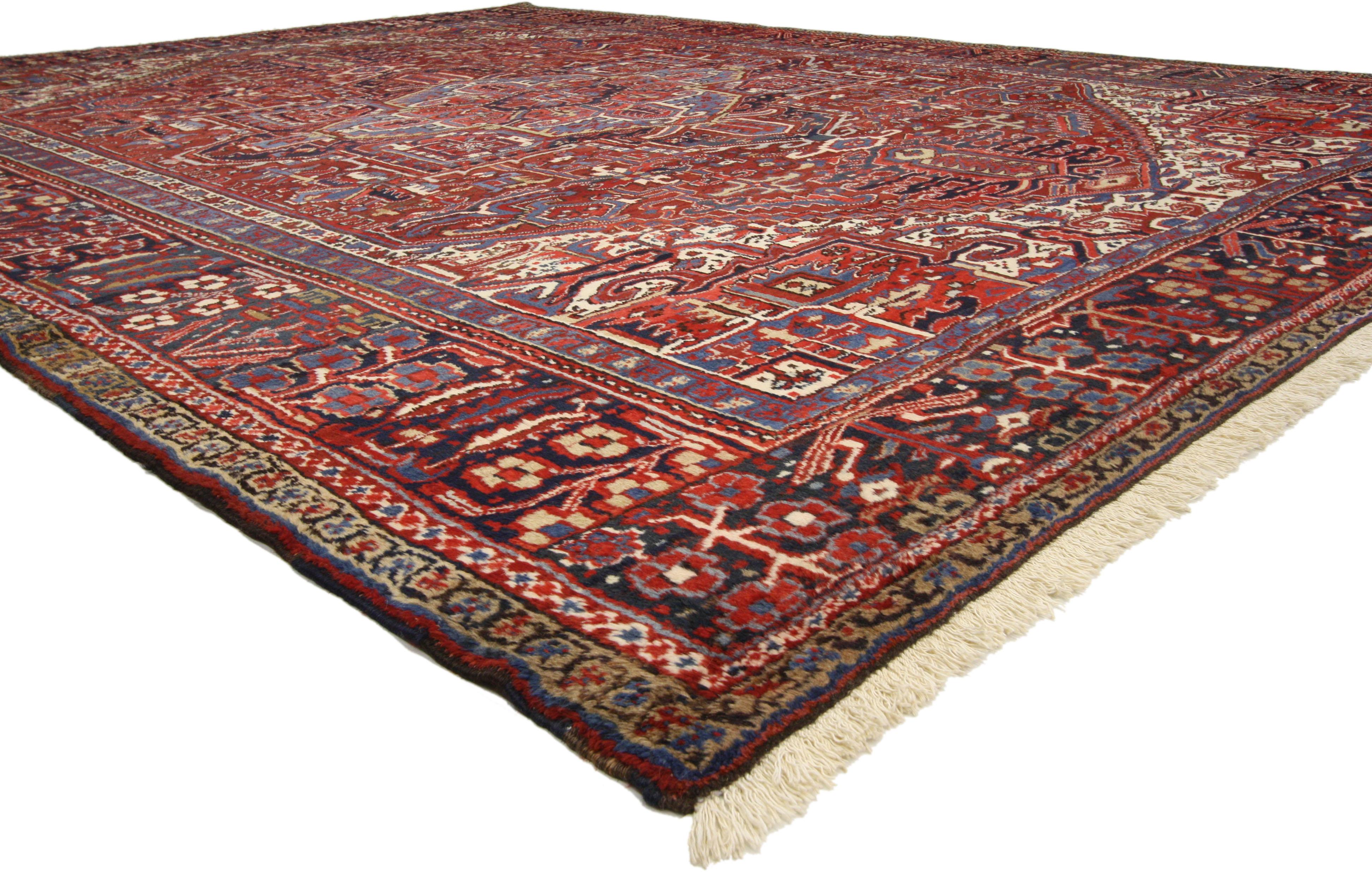 76322 Vintage Persian Heriz Area rug with Mid-Century Modern Craftsman style. Impeccably woven from hand-knotted wool, this vintage Persian Heriz rug with Mid-Century Modern Craftsman style features a large center octagram medallion anchored with
