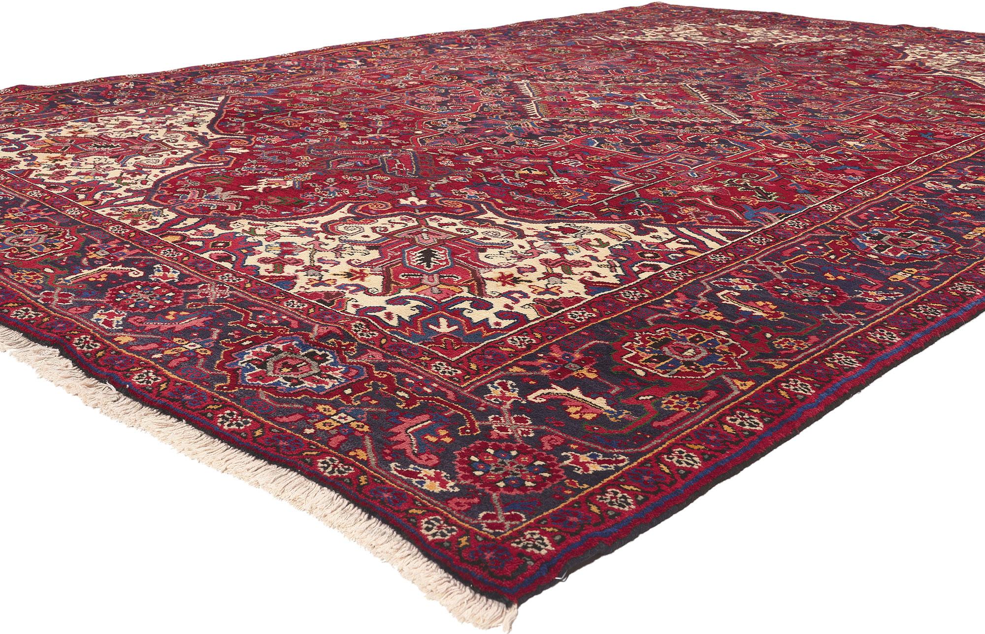 76163 Vintage Persian Heriz Rug, 07'10 x 11'04.
Classic elegance meets effortlessly chic in this hand knotted wool vintage Persian Heriz rug. The highly decorative design and sophisticated color palette woven into this piece work together creating a