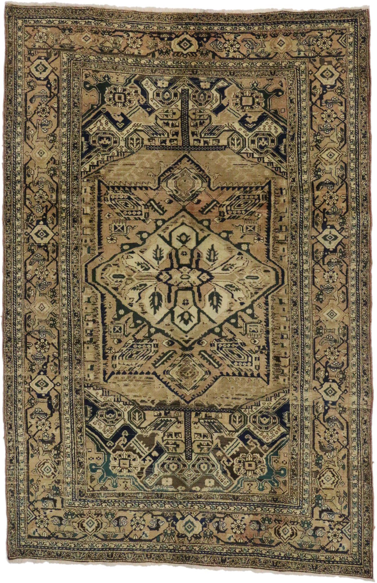 76591 Vintage Persian Heriz Rug with Modern Style 07'05 X 11'00. With appealing design aesthetic and a rare color palette after the antique wash, this hand-knotted wool vintage Persian Heriz rug is poised to impress. The warm camel colored field