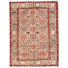 Vintage Persian Heriz Rug with Red and Black Flower Motifs on Ivory Field