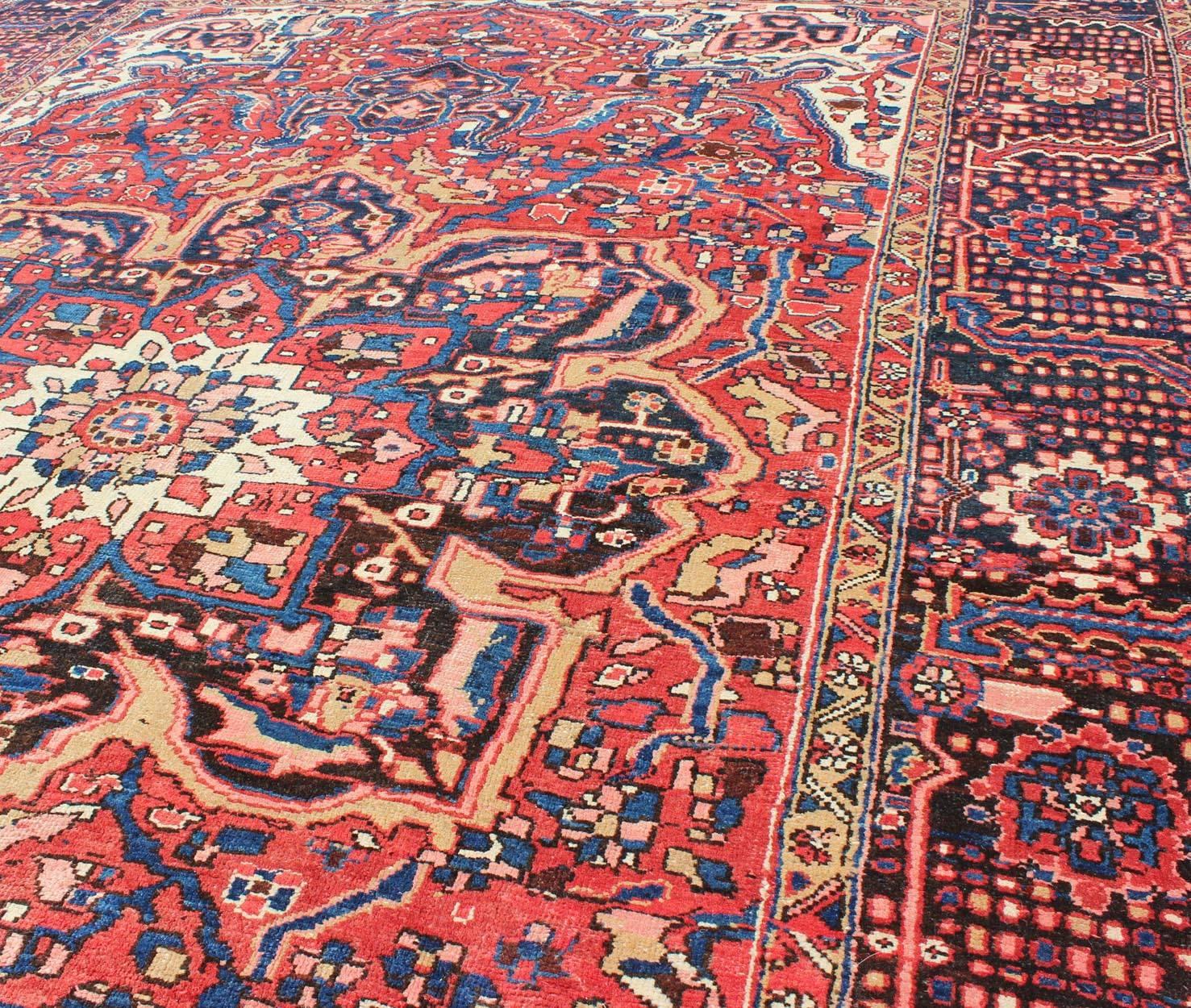 Semi Antique Persian Heriz Rug with Stylized Medallion Design in Red and Blue For Sale 2