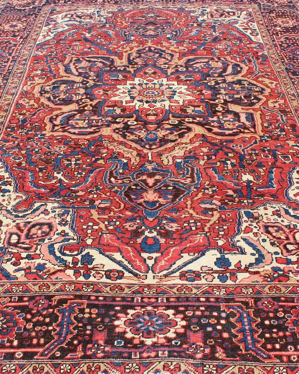 Semi Antique Persian Heriz Rug with Stylized Medallion Design in Red and Blue For Sale 3