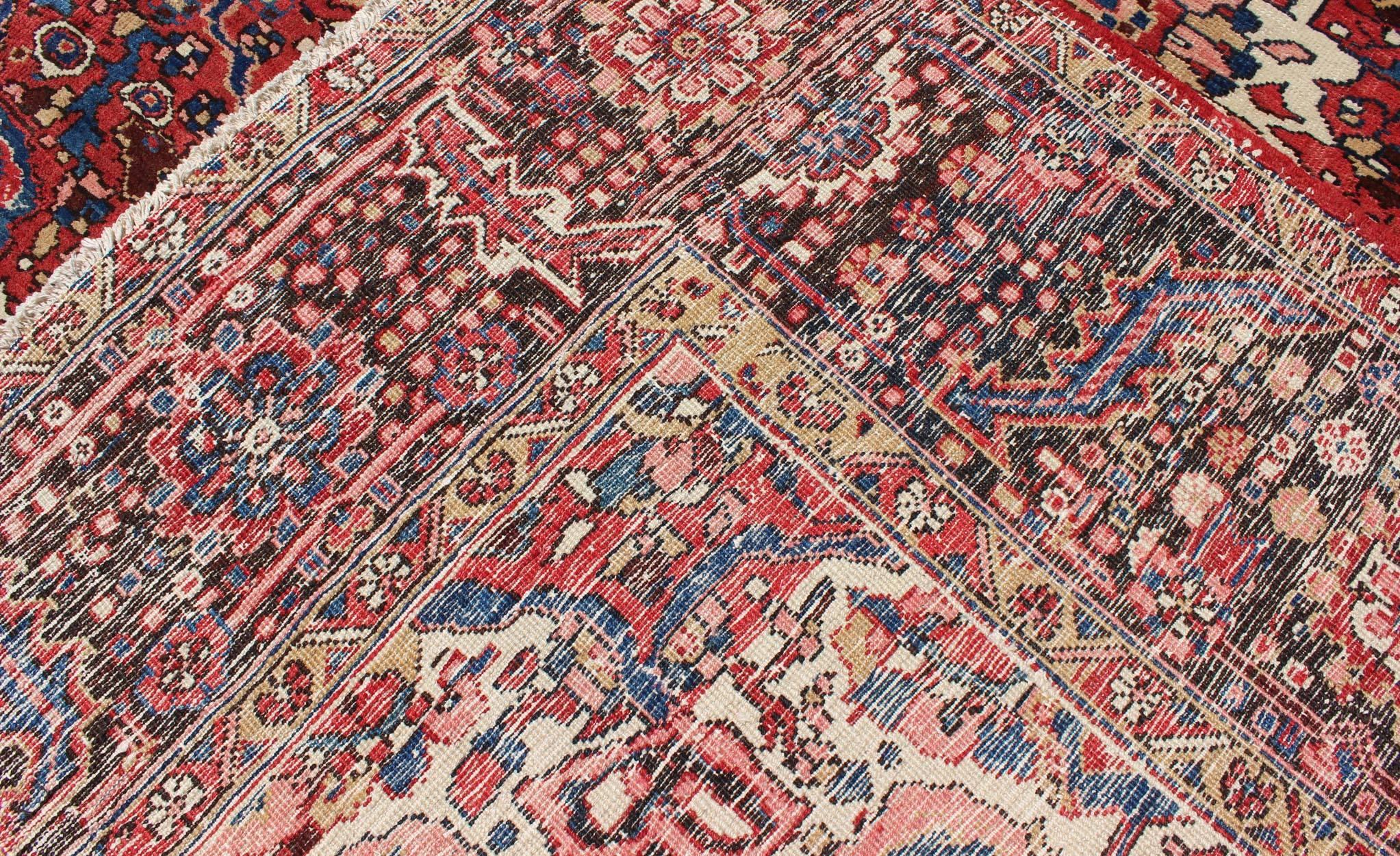 Semi Antique Persian Heriz Rug with Stylized Medallion Design in Red and Blue For Sale 4