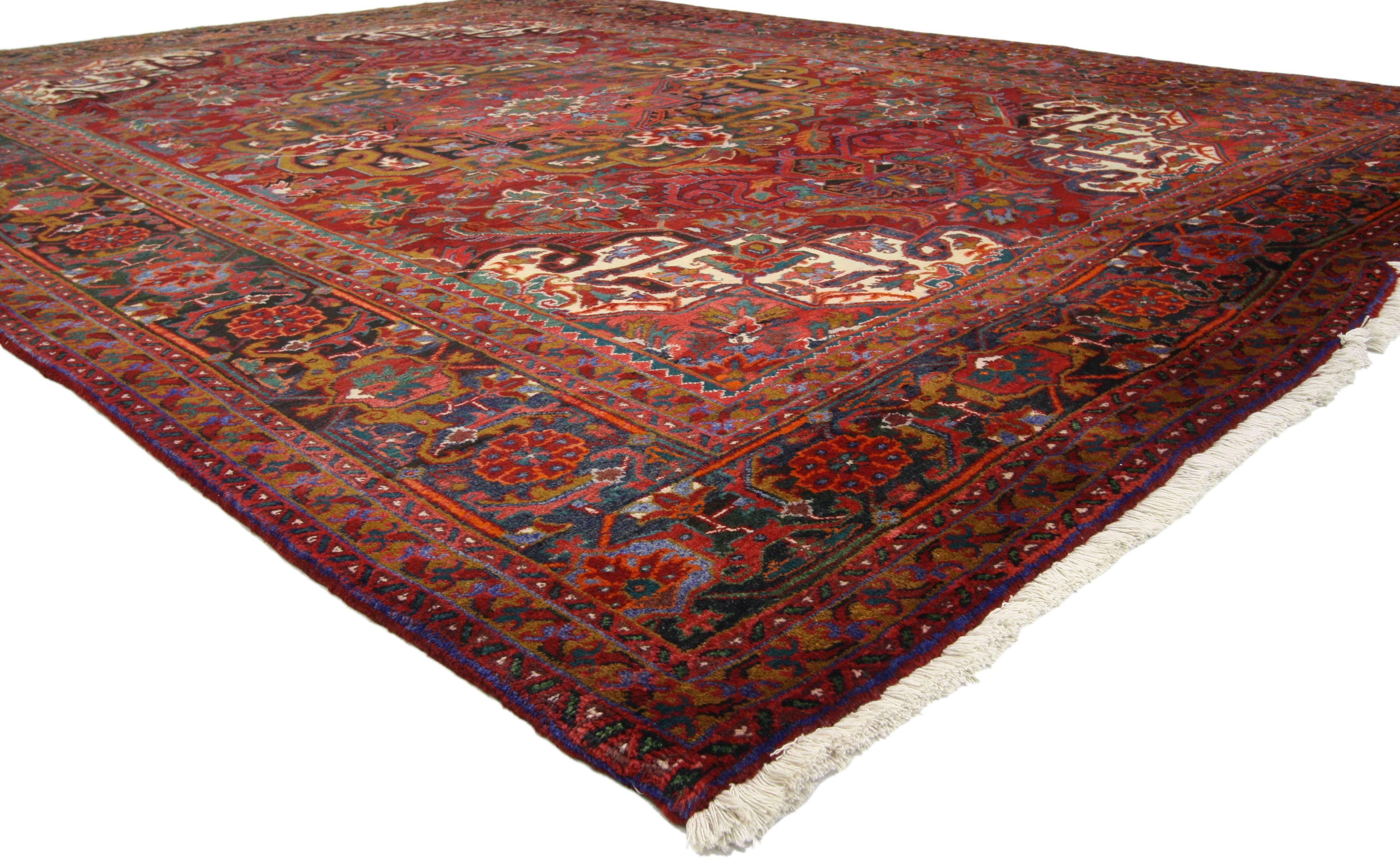 76234, vintage Persian Heriz rug with traditional style. Full of character and stately presence, this hand-knotted wool vintage Persian Heriz rug features classical elements of Persian rug design and Mid-Century Modern style. This vintage Heriz rug