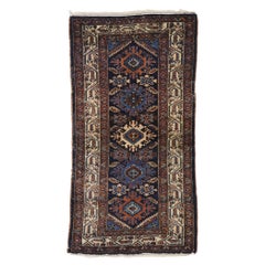 Vintage Persian Heriz Rug with Tribal Style