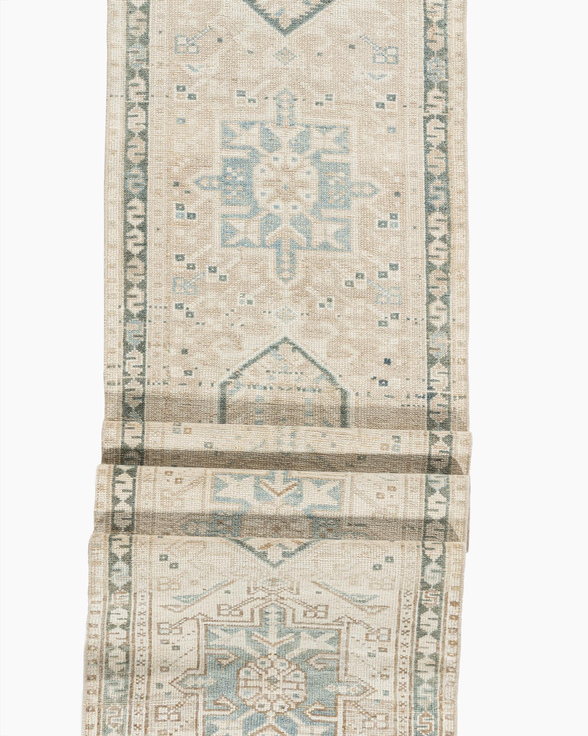 Vintage Persian Heriz Runner 1'10 X 12'8. The Heriz district of NW Persia has been weaving carpets for over a century, with geometric designs and tonalities ranging from mellow to saturated. Medallion layouts are by far the most common, but