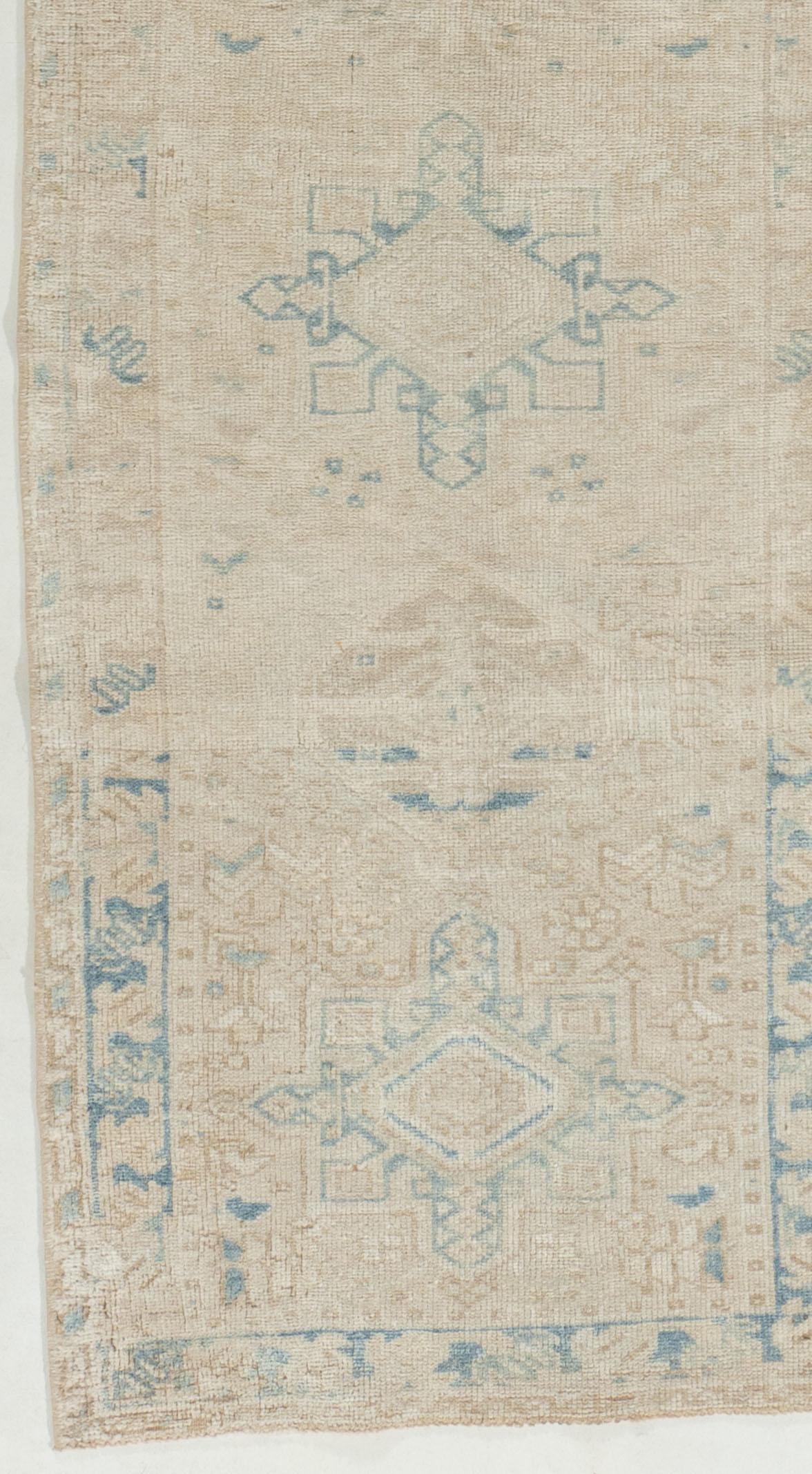 Vintage Persian Heriz Runner 2'6 X 7'11. As perpetually fashionable as they are collectible, traditional Heriz rugs are skillfully woven in emphatic geometric designs. This rug has a character all its own with soft colors giving a feeling of