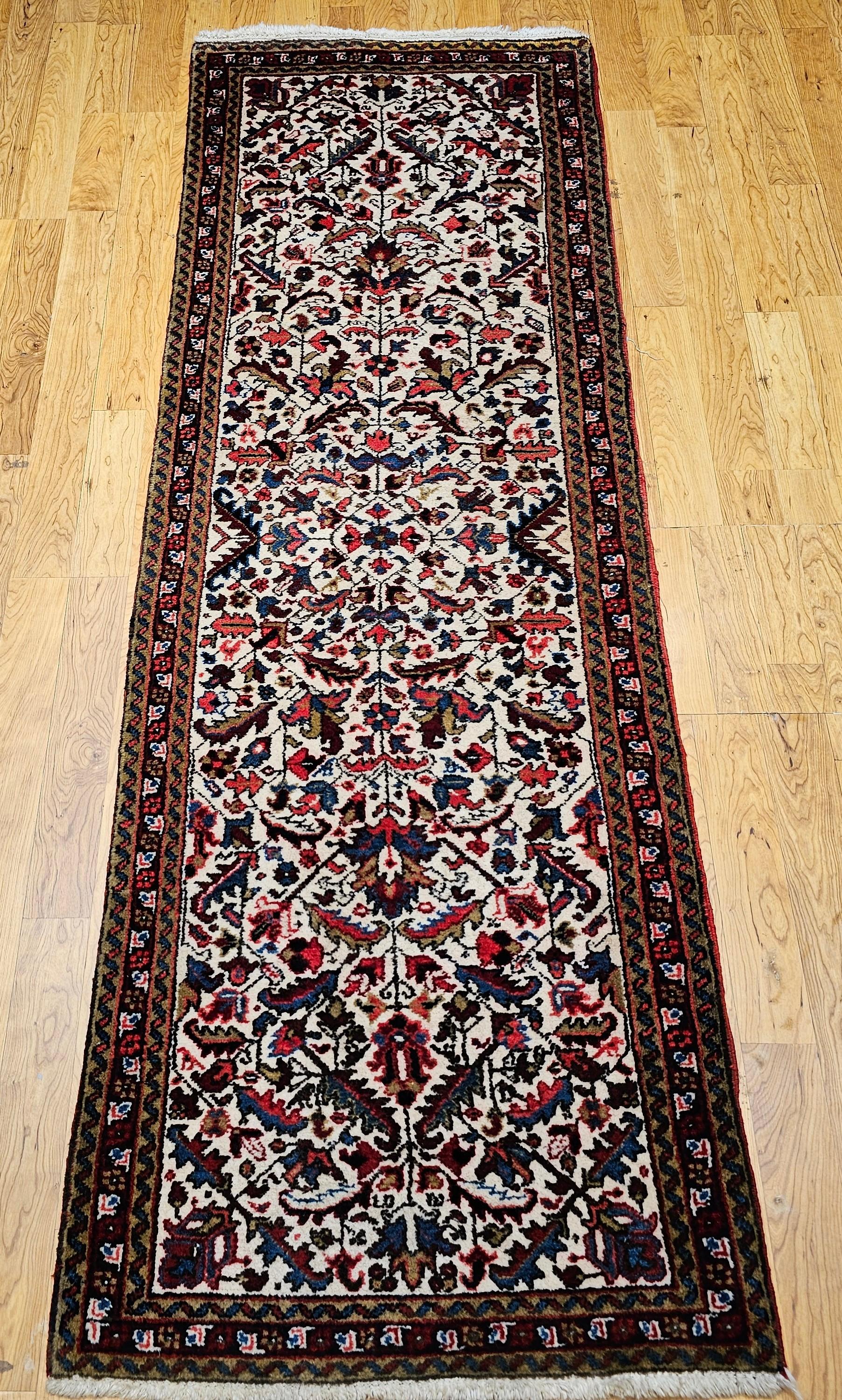 The Vintage Persian Heriz runner, meticulously hand-knotted in the second quarter of the 20th century. What sets this runner apart as remarkably unique and extremely rare is it's allover geometric pattern, a highly desirable design choice,