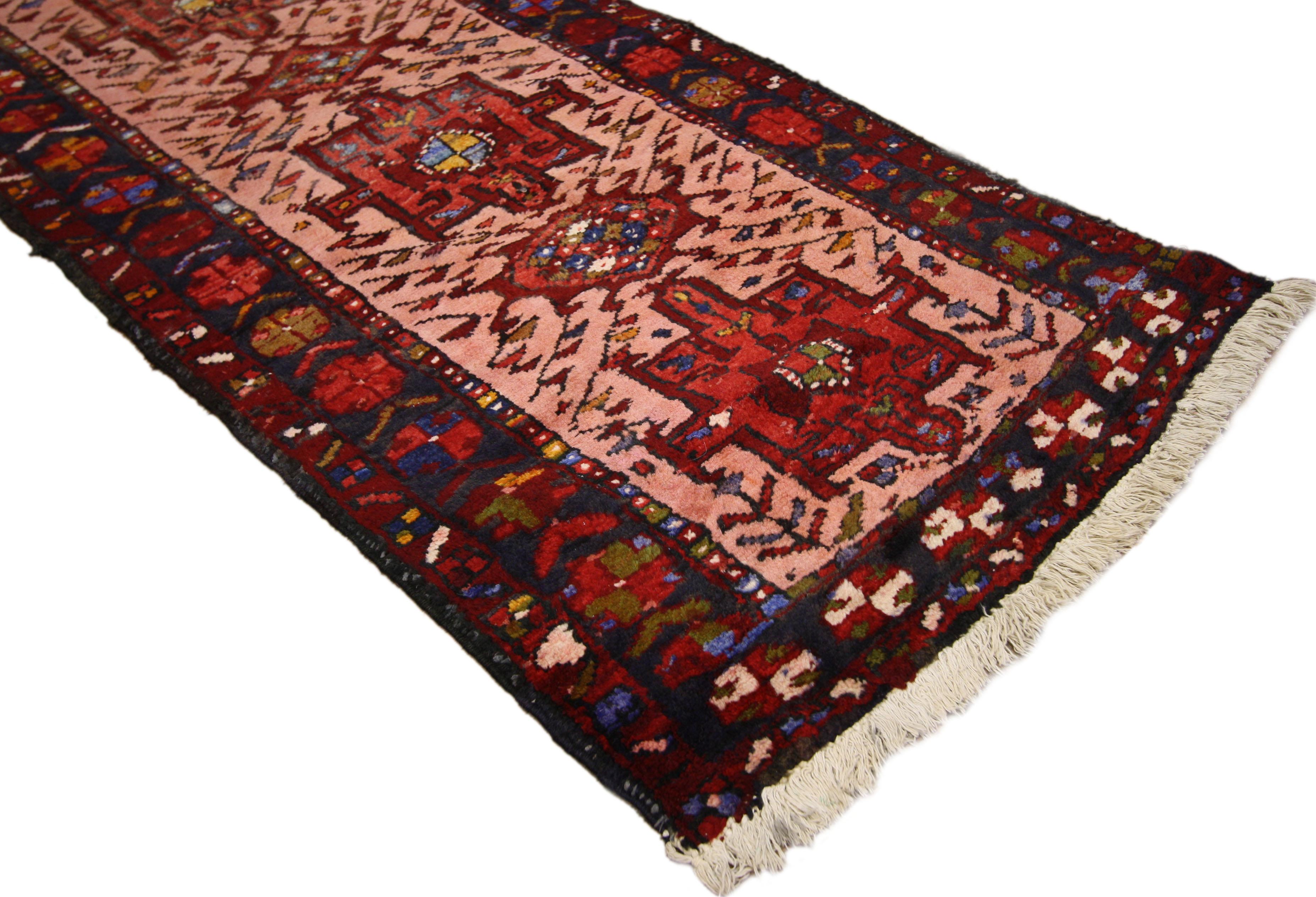 60203 Vintage Persian Heriz Runner with Jacobean Style, Narrow Hallway Runner. Hand-knotted wool vintage Persian Heriz carpet runner with Jacobean style featuring alternating geometric and amulet medallions in an abrashed field surrounded with