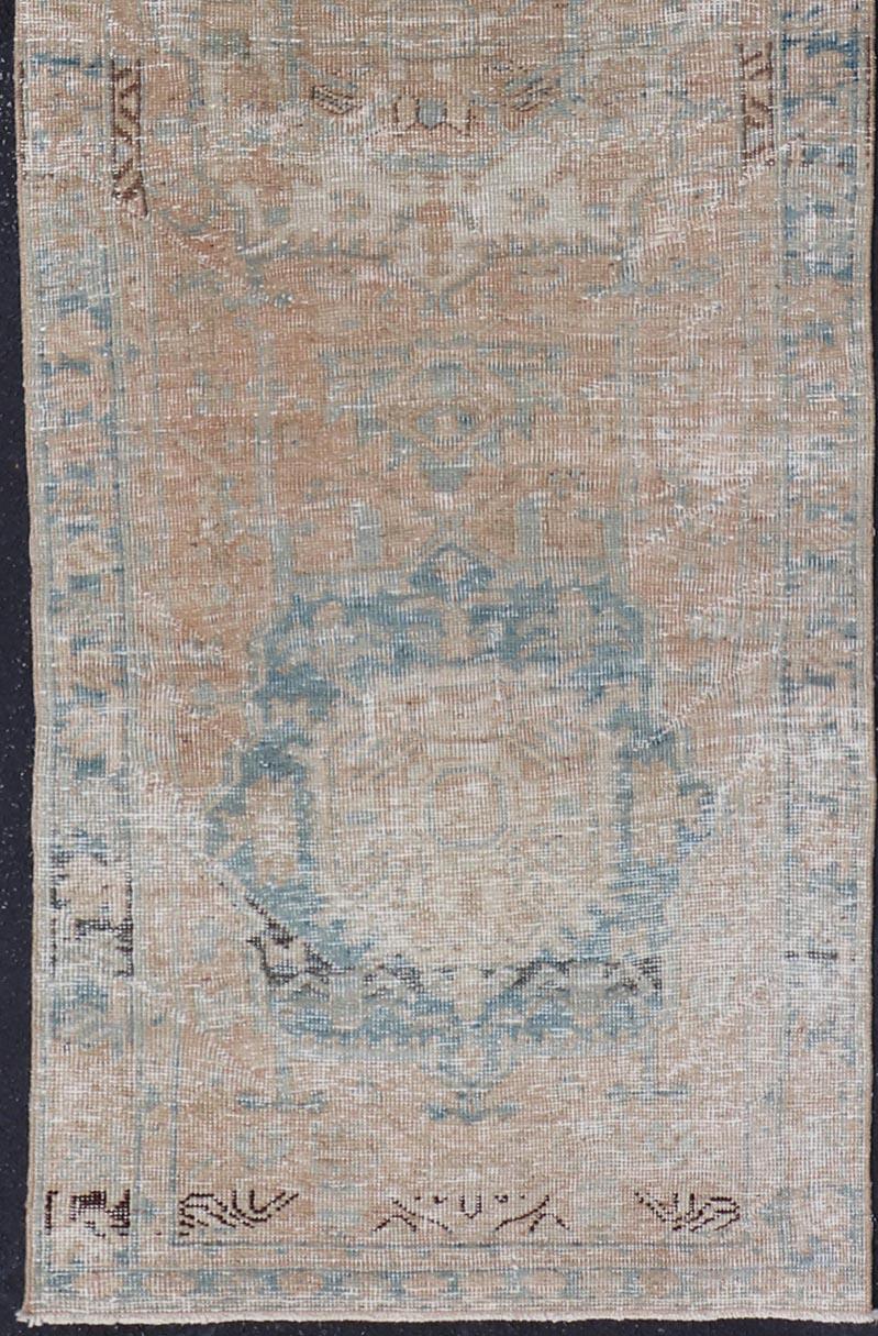 Hand-Knotted Vintage Persian Heriz Runner with Medallions in Earthy Tones and Light Blue For Sale