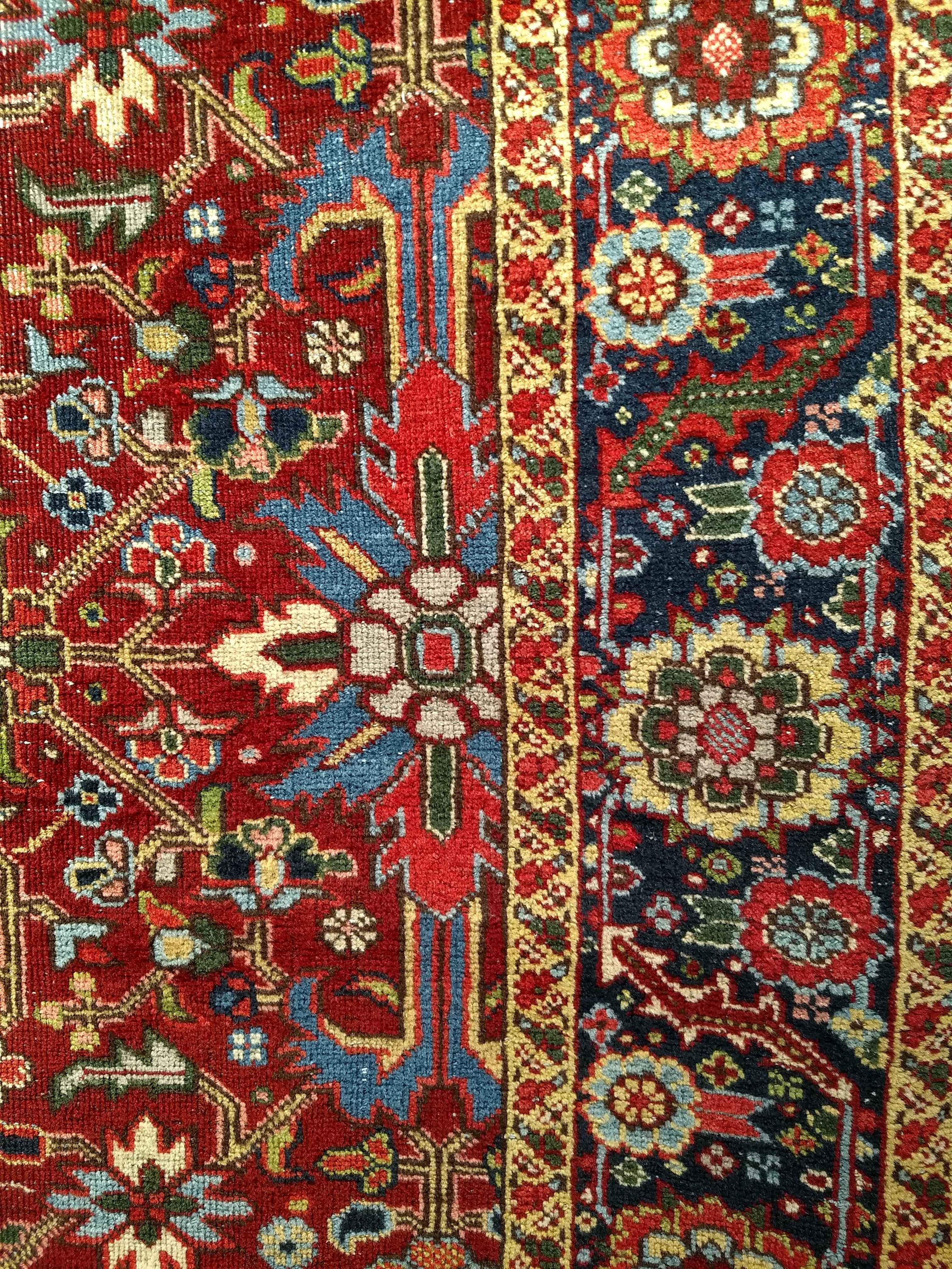 20th Century Vintage Persian Heriz Serapi in an All-Over Pattern in Red, Yellow, Green, Pink For Sale