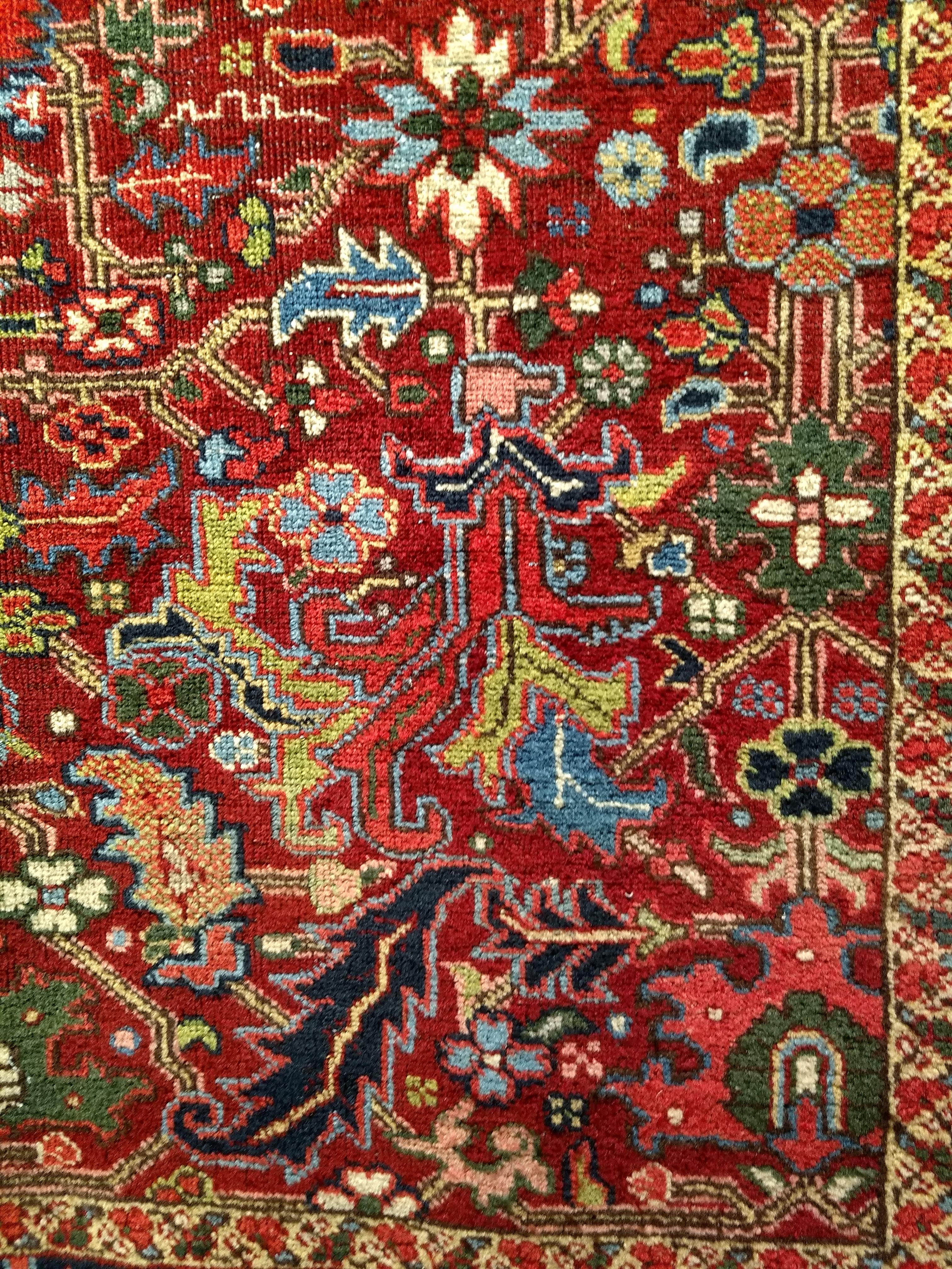 Wool Vintage Persian Heriz Serapi in an All-Over Pattern in Red, Yellow, Green, Pink For Sale
