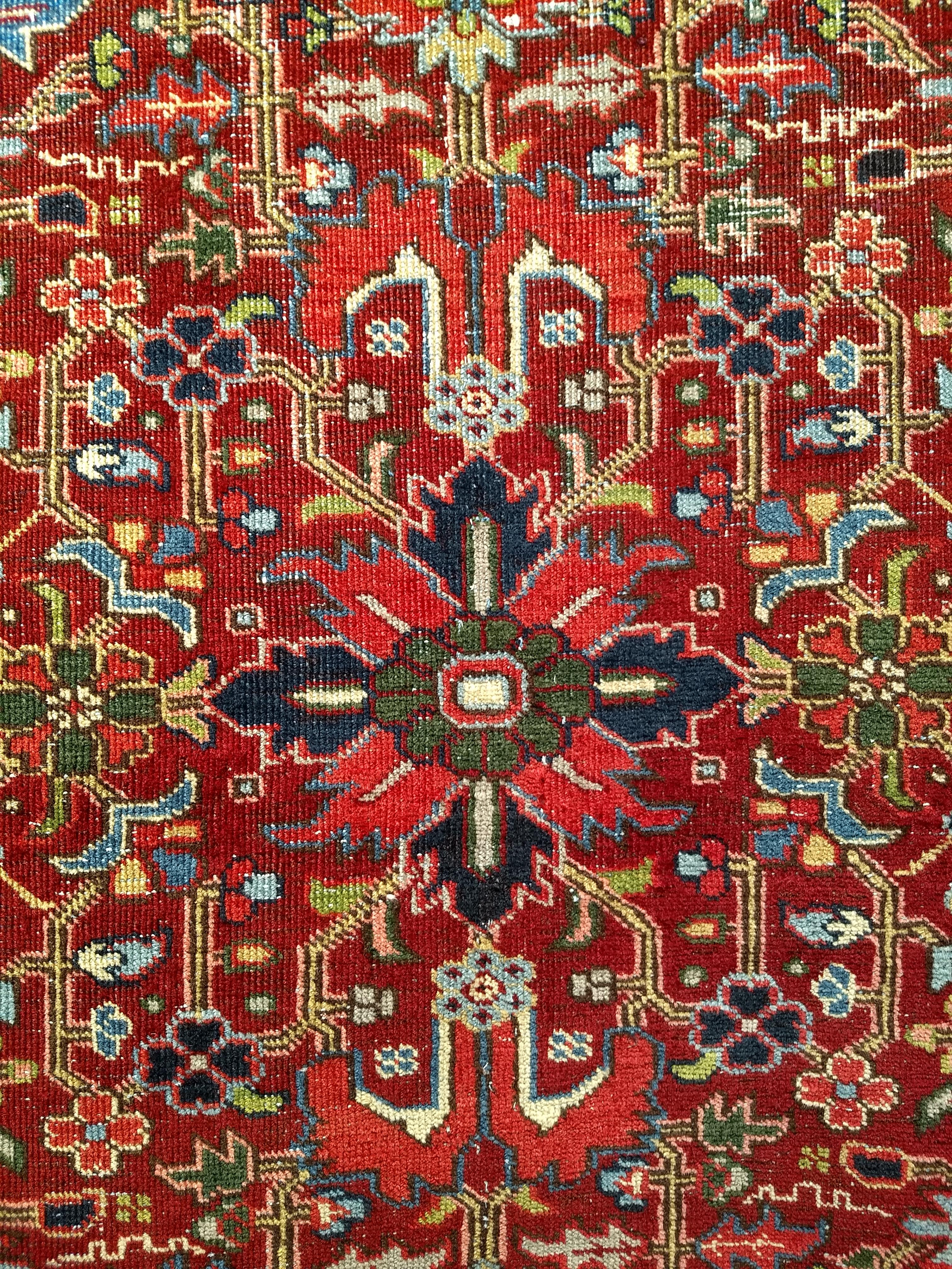 Vintage Persian Heriz Serapi in an All-Over Pattern in Red, Yellow, Green, Pink For Sale 1