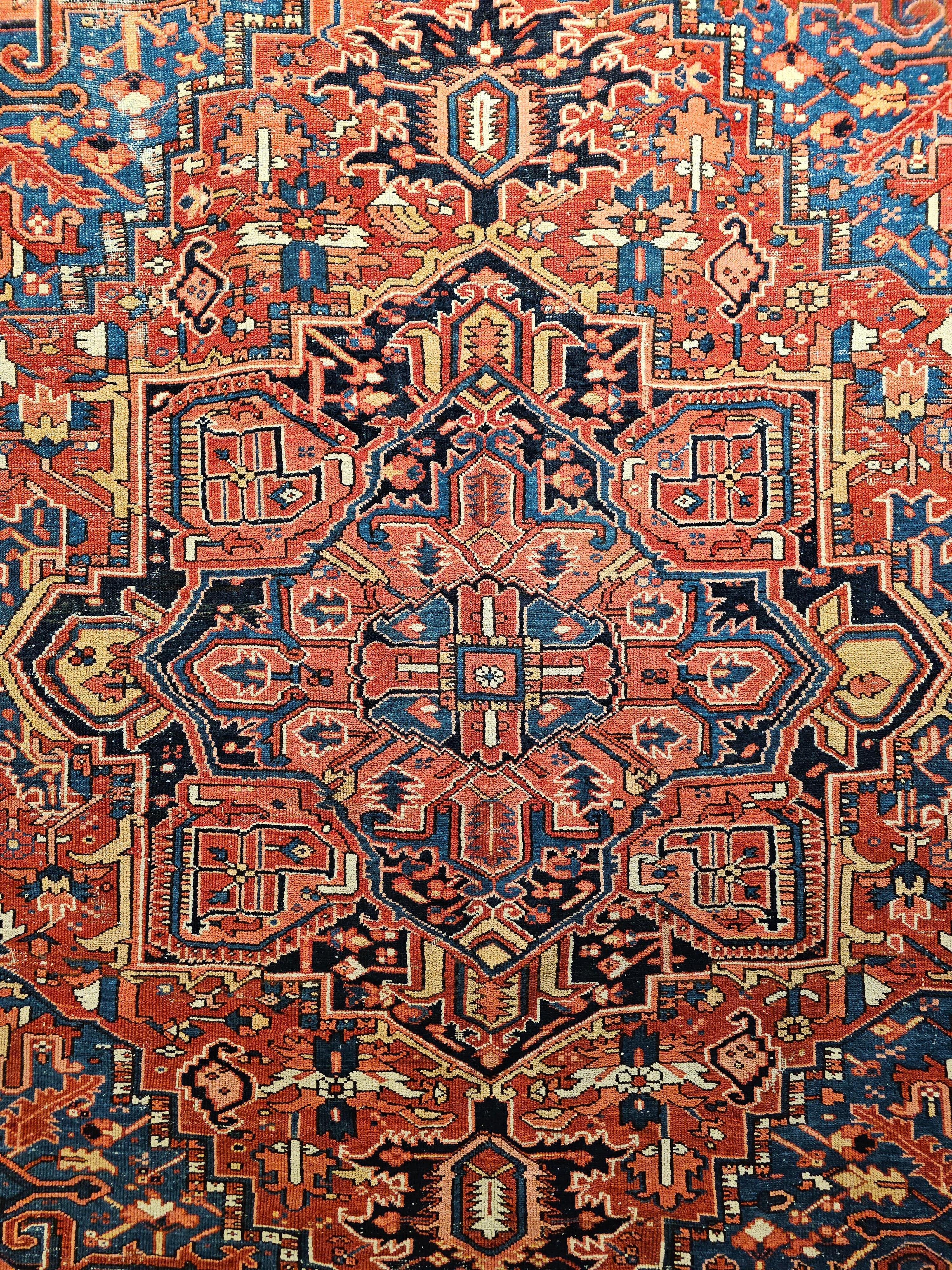 19th Century Vintage Persian Heriz Serapi with Abrash French Blue, Yellow, and Red Colors For Sale