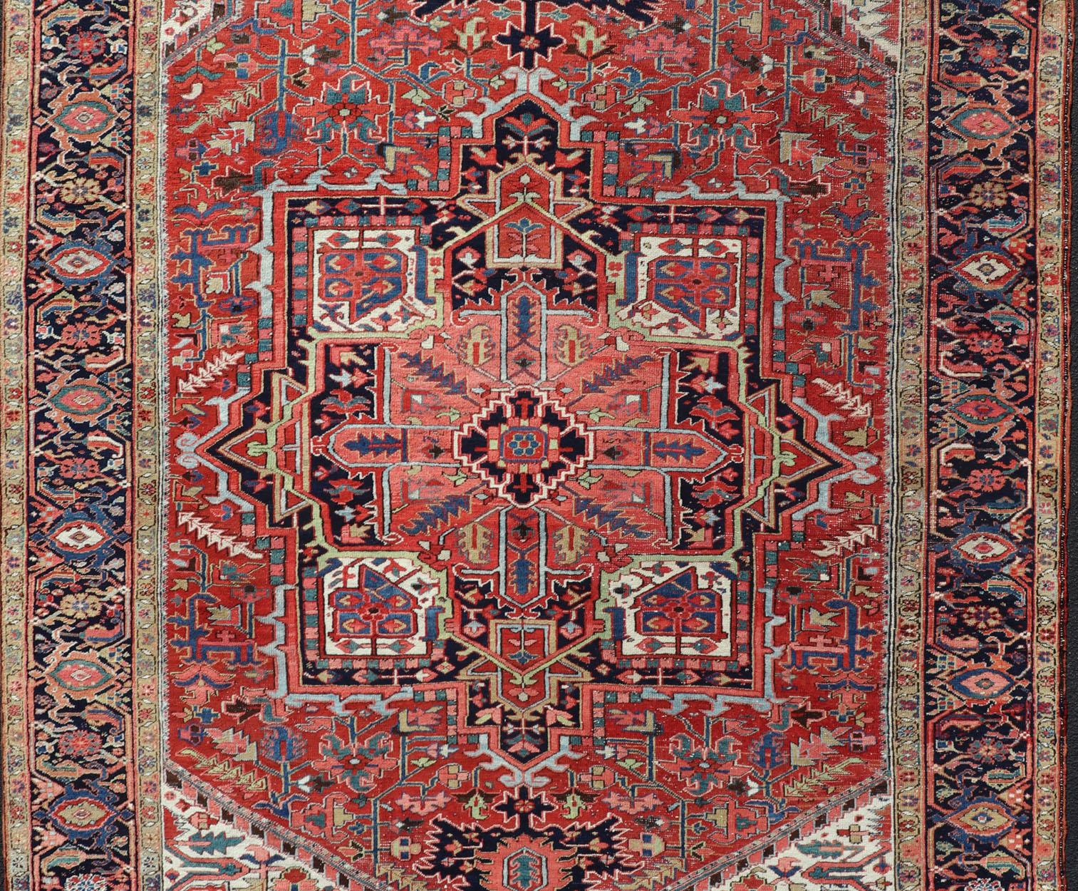 Antique Persian Heriz. Keivan Woven Arts / rug/ EMB-9636-P13586, country of origin / type: Iran, Persian / Heriz, circa Early-20th century

Measures: 8'6'' x 12'0''

This lovely antique Heriz rug, hailing from northwestern Iran (circa 1930s),
