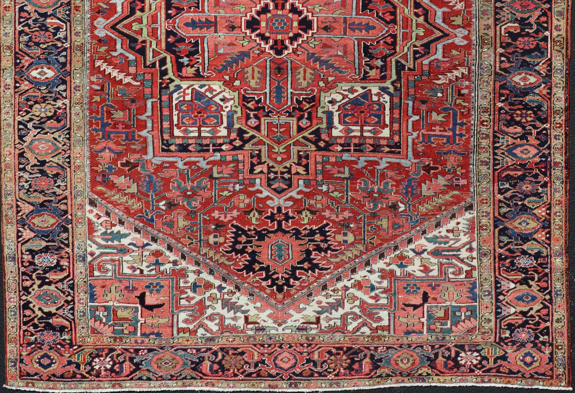 Heriz Serapi Antique Persian Heriz with Central Medallion Design in Red and Jewel Tones  For Sale