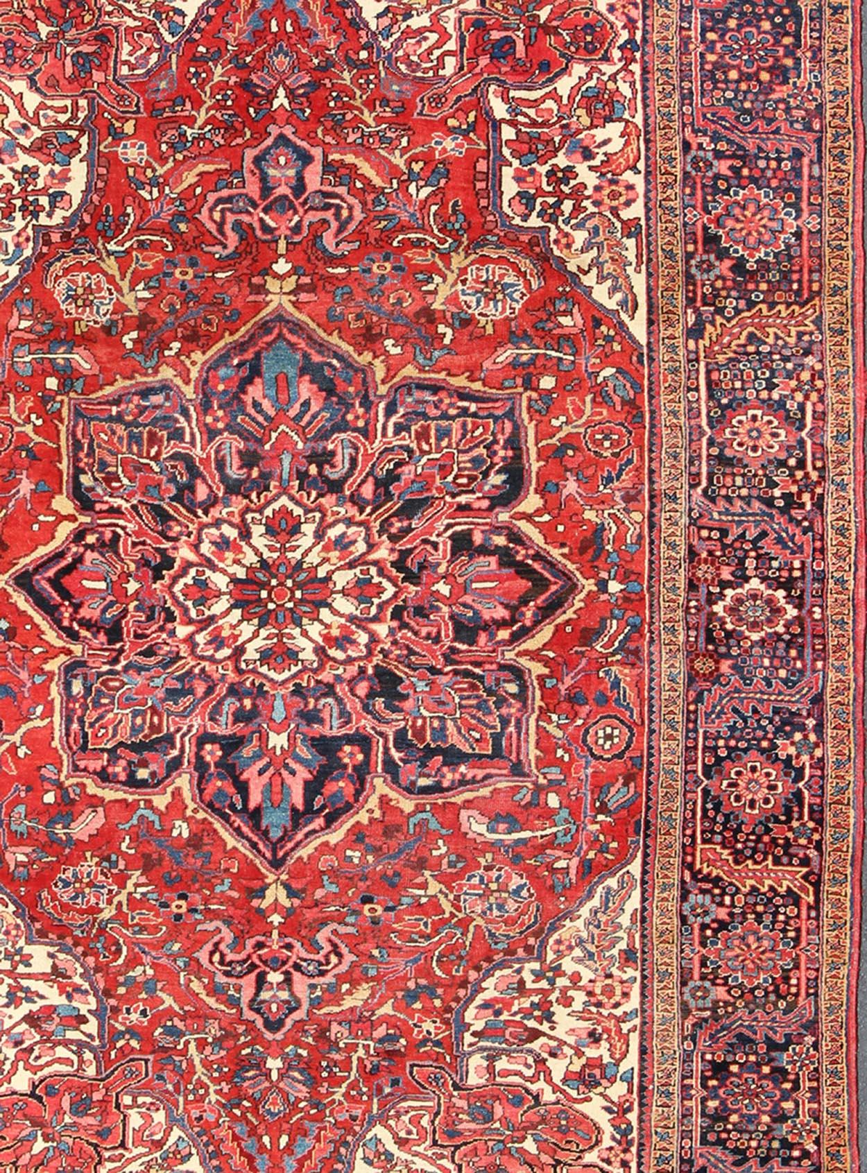 Layered Medallion design Heriz vintage rug from Persia in multi-colors, rug, TRA-SHLLI, country of origin / type: Iran / Heriz, circa 1950.

This vintage Persian Heriz, from northwest Iran, displays a geometric medallion design and a variety of
