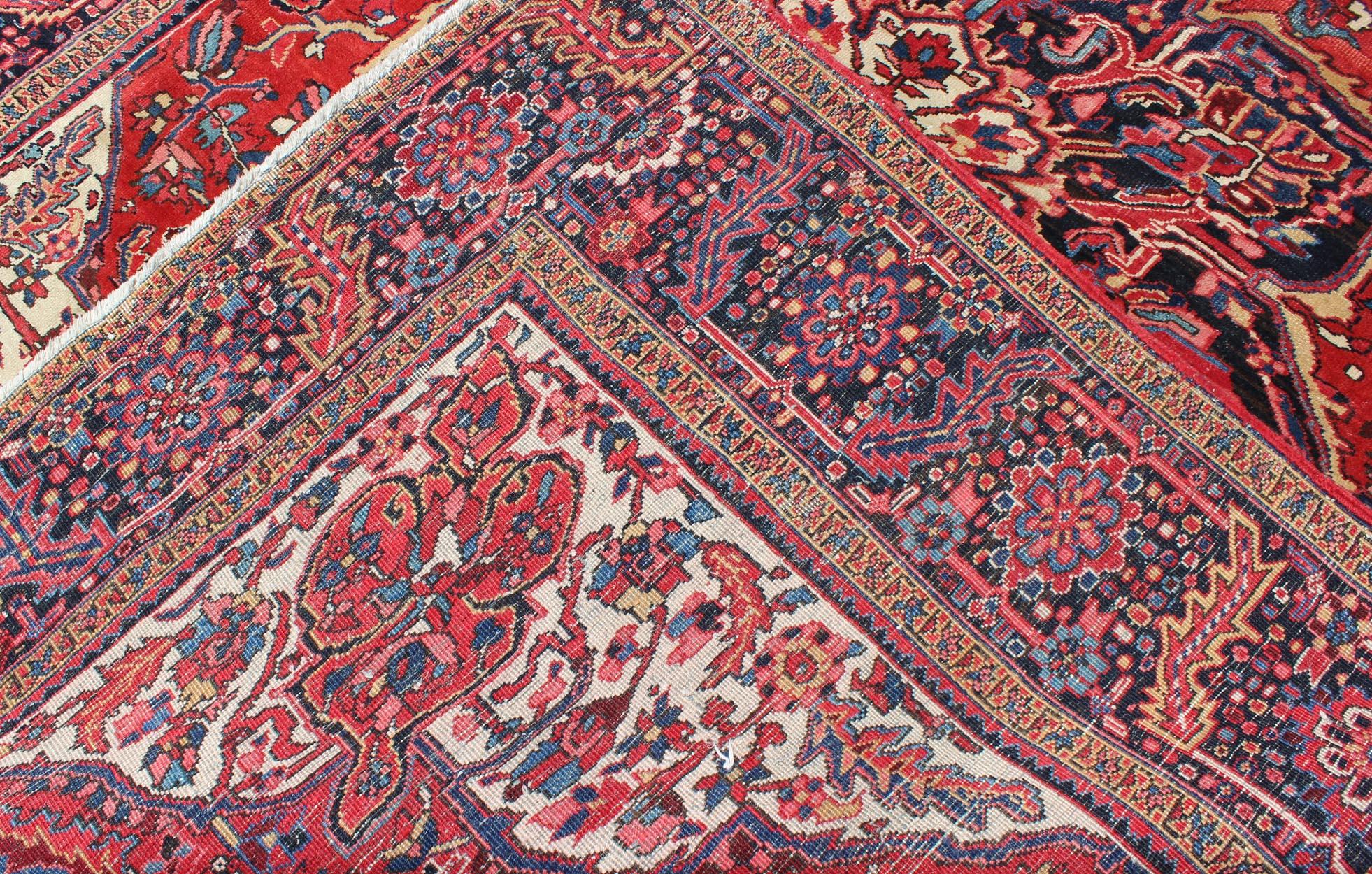 Vintage Persian Heriz with Large Medallion in Beautiful Red and Blue In Good Condition For Sale In Atlanta, GA