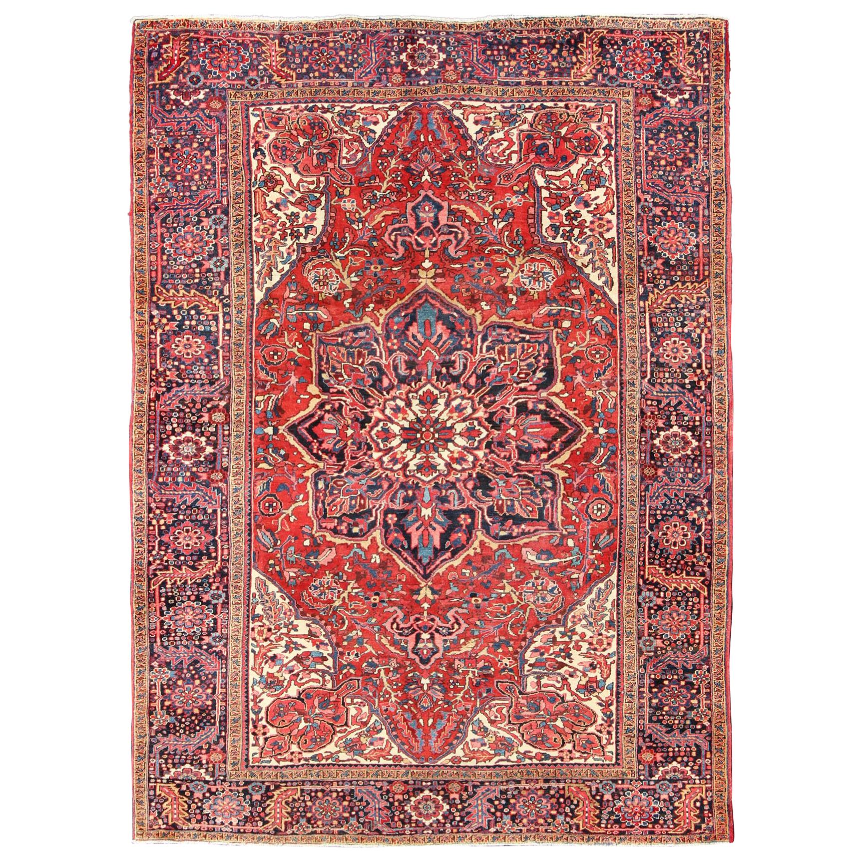 Vintage Persian Heriz with Large Medallion in Beautiful Red and Blue For Sale