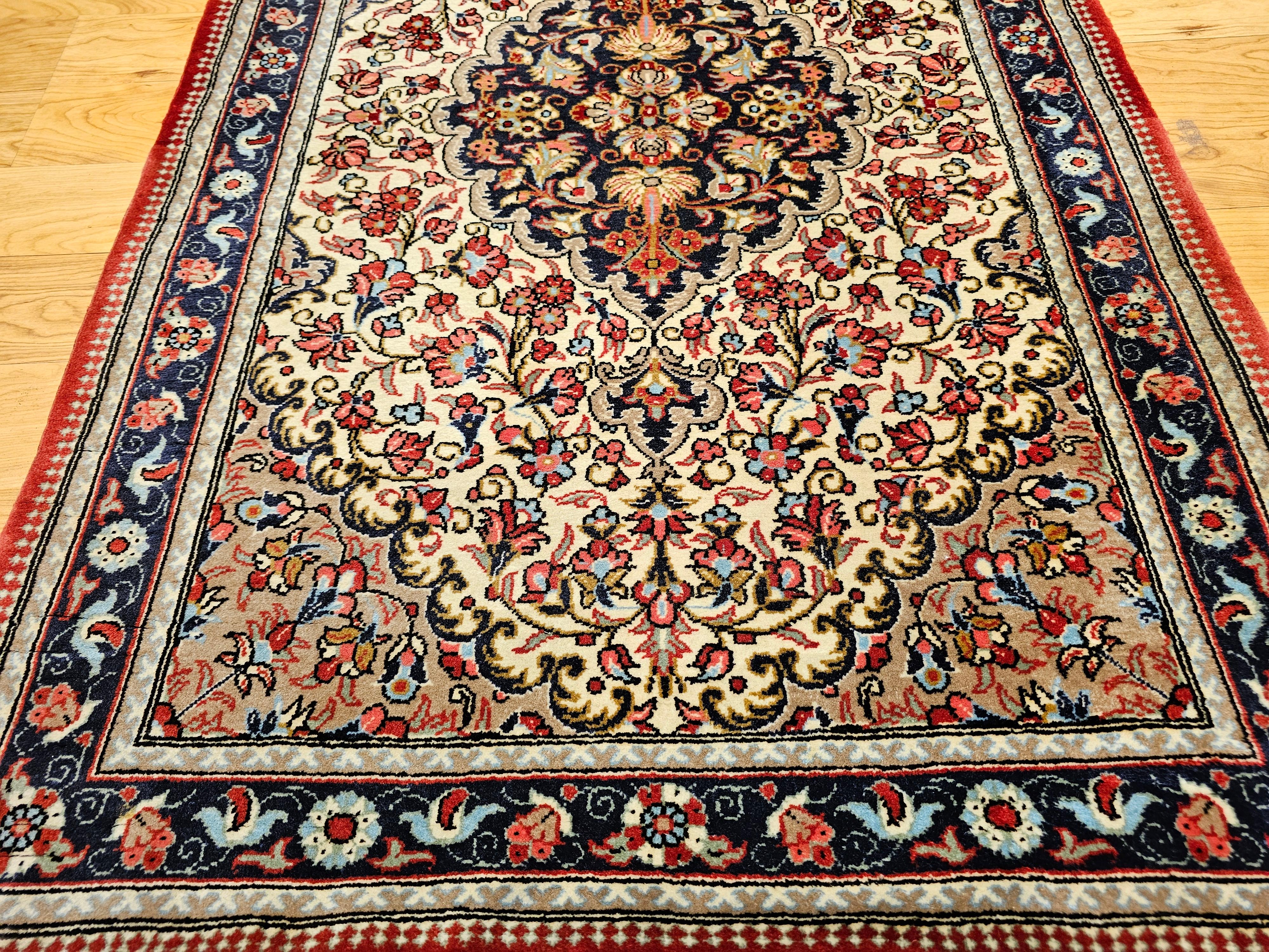 Hand-Woven Vintage Persian Isfahan Area Rug in Floral Pattern in Ivory, Navy, Red, Blue For Sale
