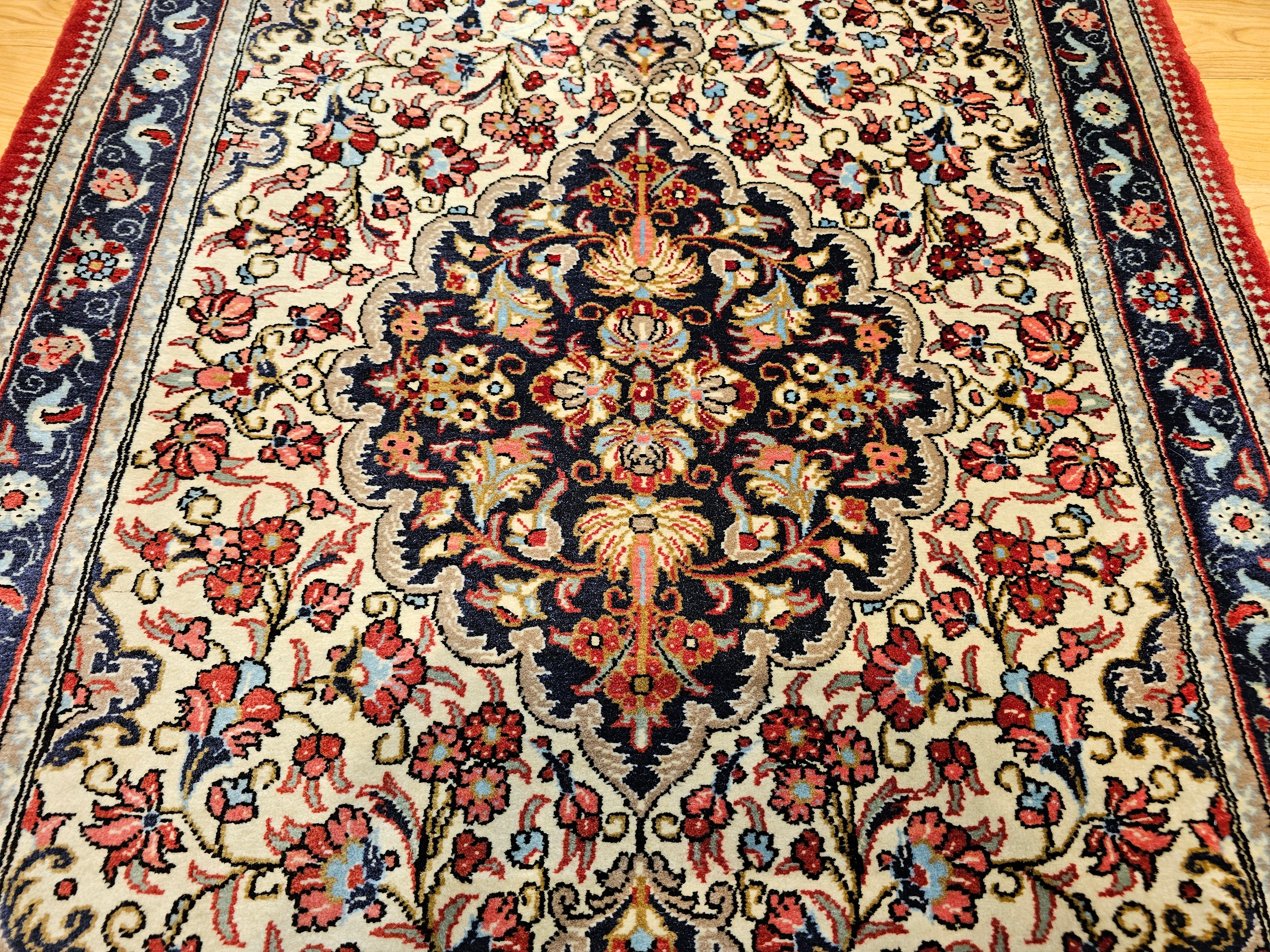 Vintage Persian Isfahan Area Rug in Floral Pattern in Ivory, Navy, Red, Blue In Good Condition For Sale In Barrington, IL