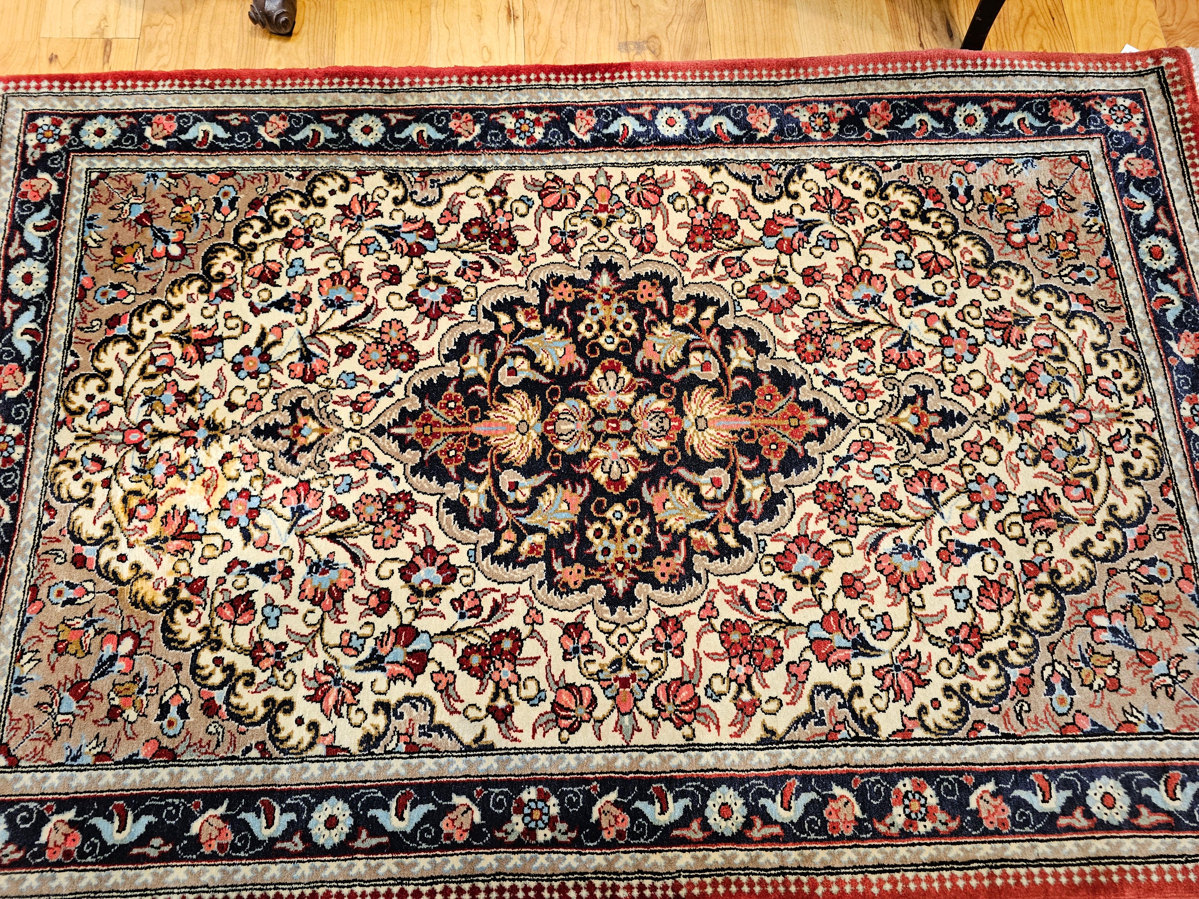 Wool Vintage Persian Isfahan Area Rug in Floral Pattern in Ivory, Navy, Red, Blue For Sale