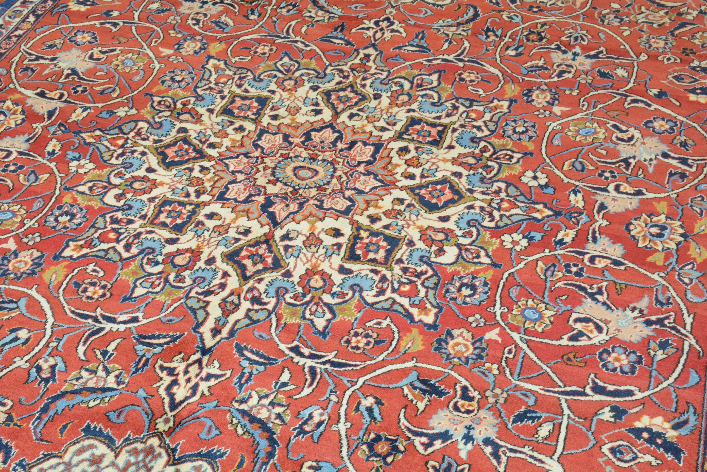 Najafabad is a small town that produces rugs and carpets located outside the major weaving center of Isfahan in central Iran.  It is also recognized as the trade center for an agricultural region noted for its pomegranates.  Rugs from this town have