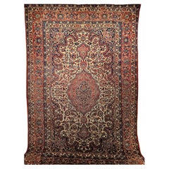 Tapis persan Isfahan vintage à motif floral en ivoire, rouge, bleu