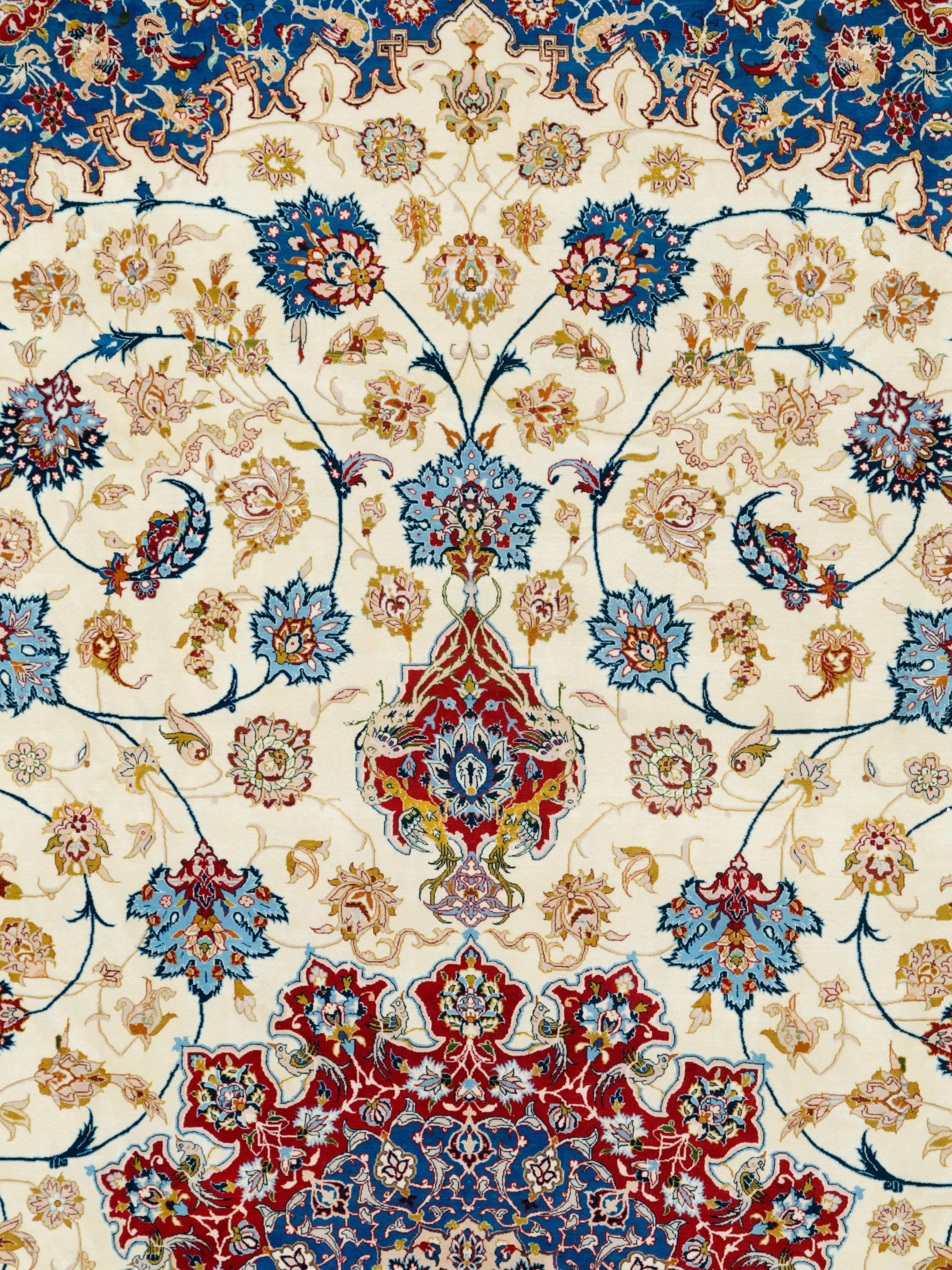 A vintage Persian Isfahan rug from the mid-20th century.