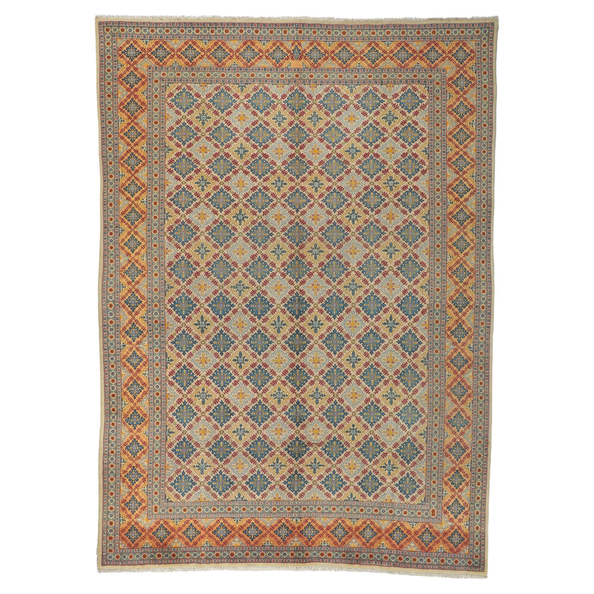 Vintage Persian Isfahan Rug, Moorish Elegance Meets Mediterranean Charm For Sale