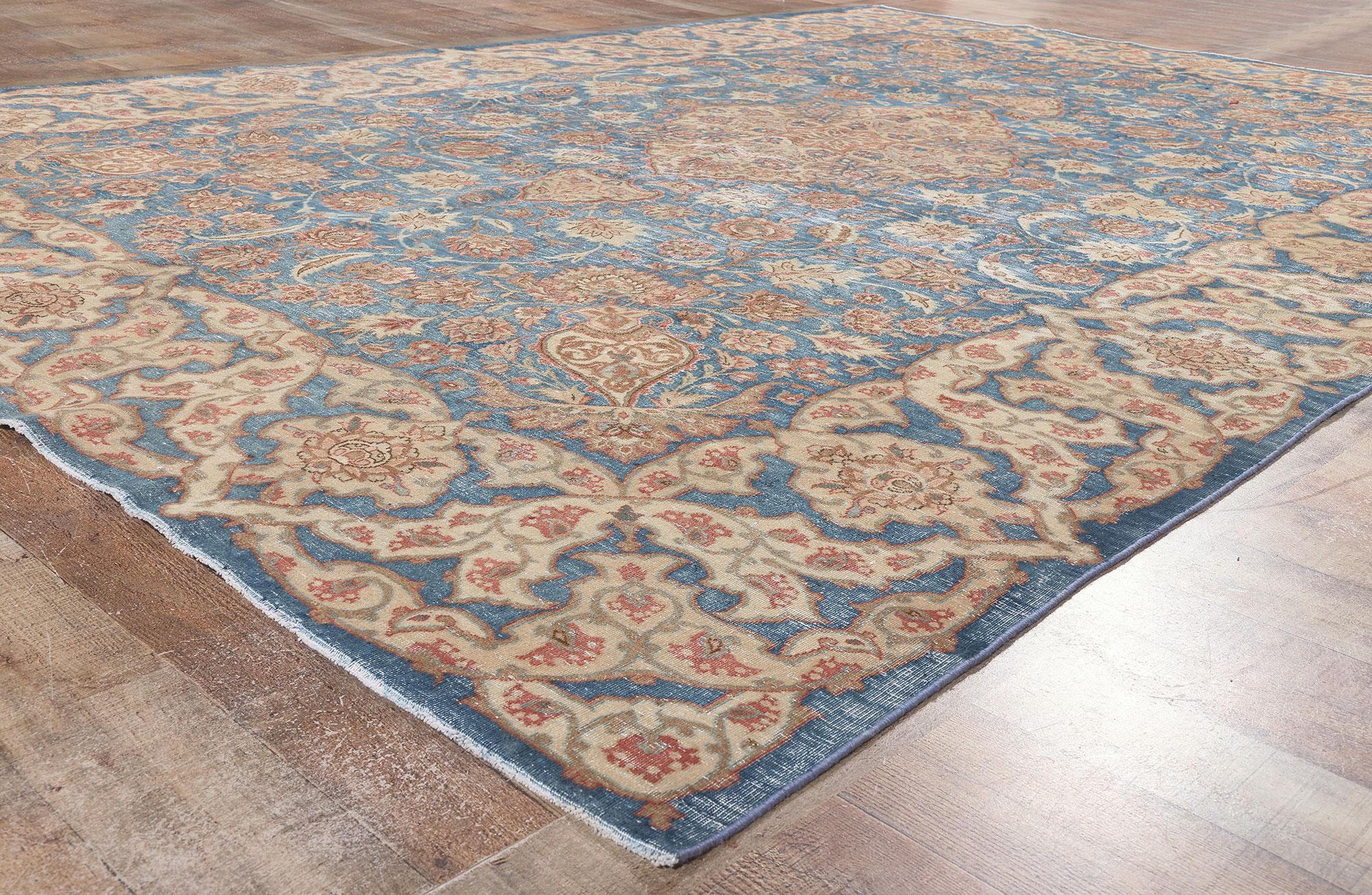 Wool Vintage Persian Isfahan Rug, Relaxed Refinement Meets Mediterranean Charm For Sale