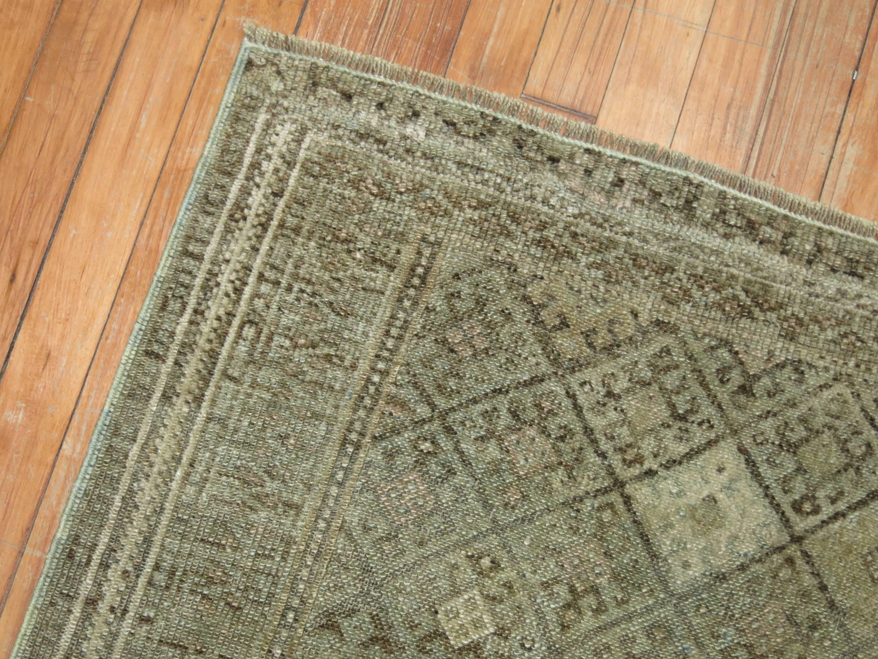 A mid-20th century muted Persian Jaff rug.