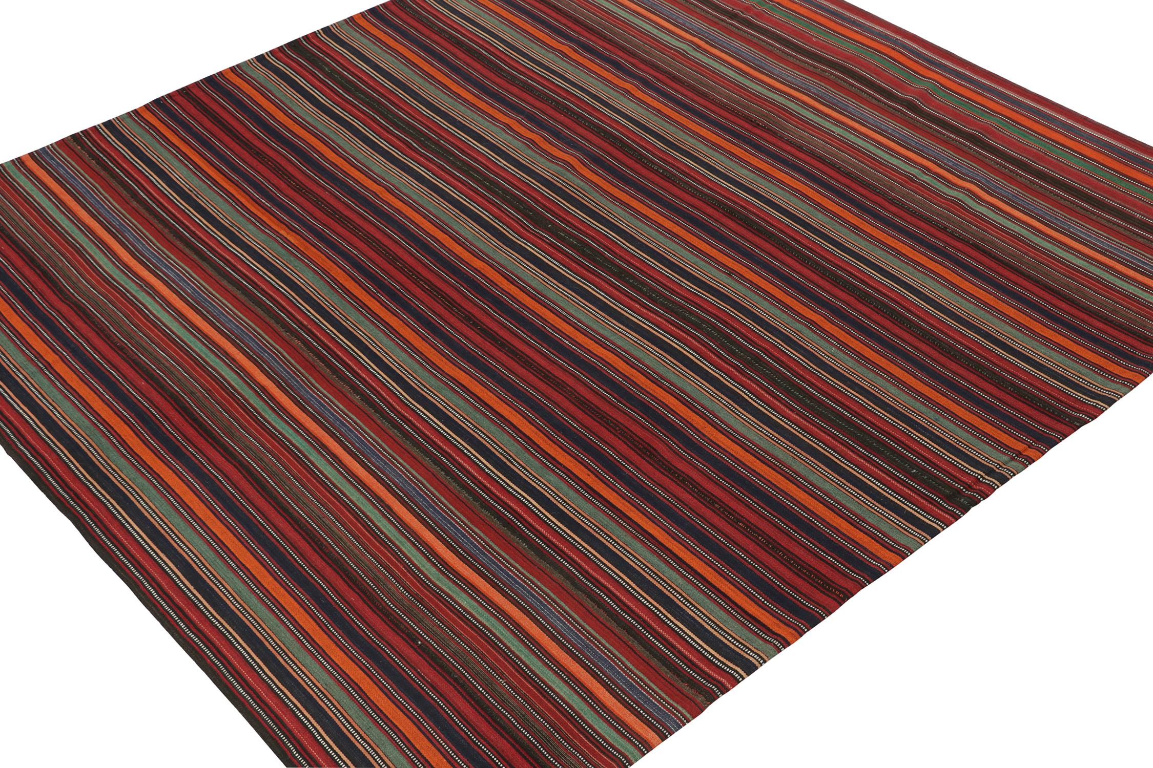 This vintage 8x8 Persian kilim is a Jajim style curation, handwoven in wool circa 1950-1960. 

Further on the Design:

This rich design prefers red, orange, blue, black in a gorgeous yet simple play of polychromatic stripes. Its natural sense of
