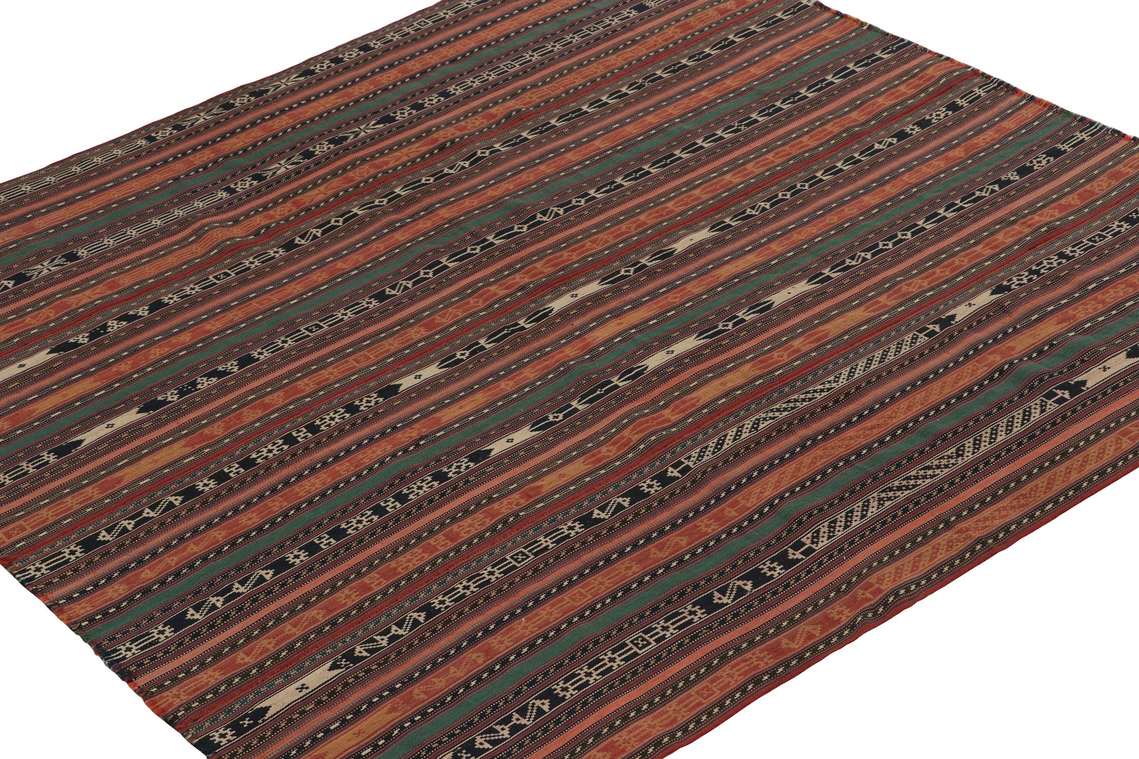 This vintage 5x7 Persian kilim is a Jajim style curation, handwoven in wool circa 1950-1960. 

Further on the Design:

This design prefers red, forest green, gold, black and off-white in a gorgeous yet simple play of polychromatic stripes. Its