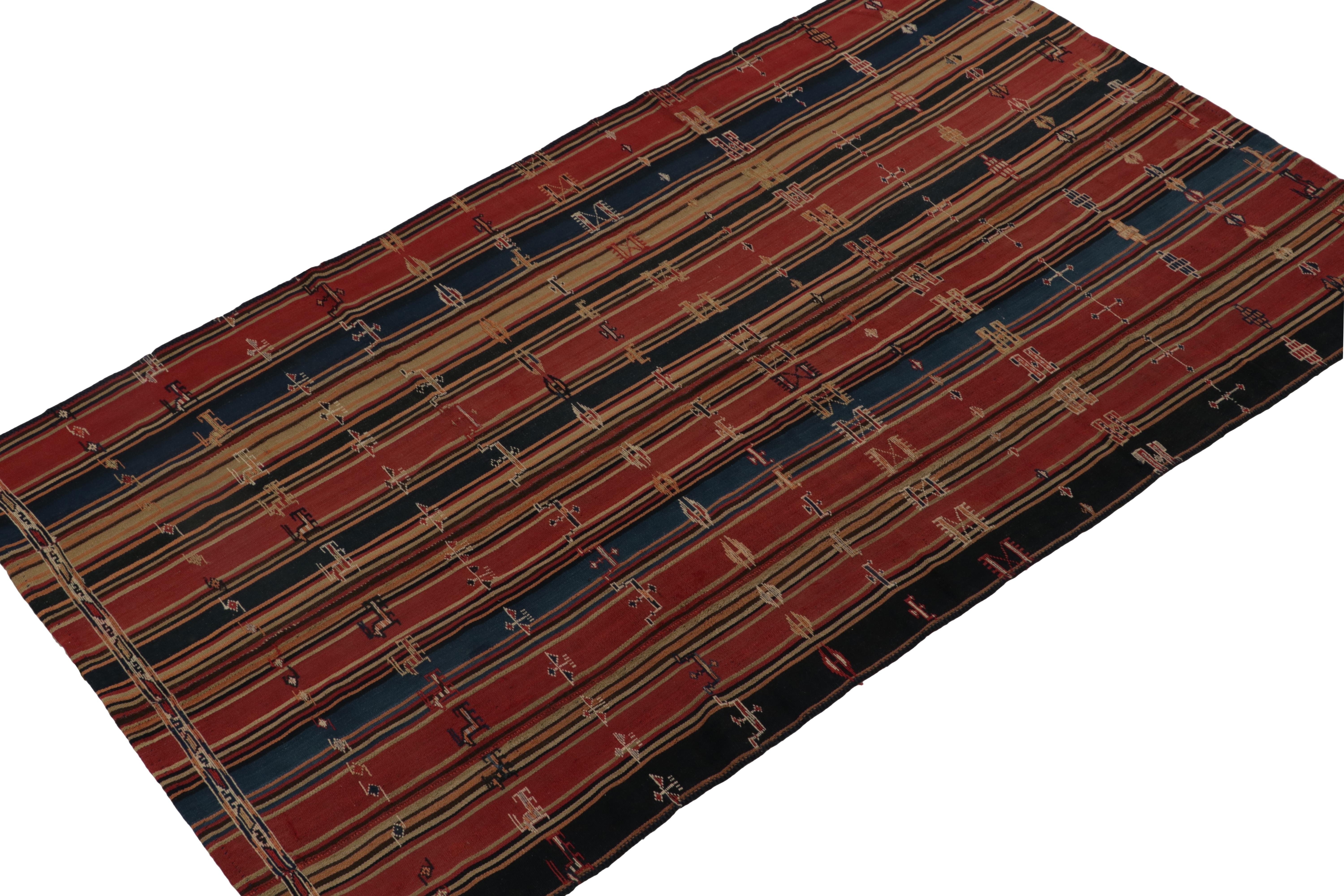 This vintage 5x8 Persian kilim is a Jajim style curation, handwoven in wool circa 1950-1960. 

Further on the Design:

This rich repeat design prefers brick red, navy blue, rust, and beige-brown in a gorgeous yet simple play of polychromatic