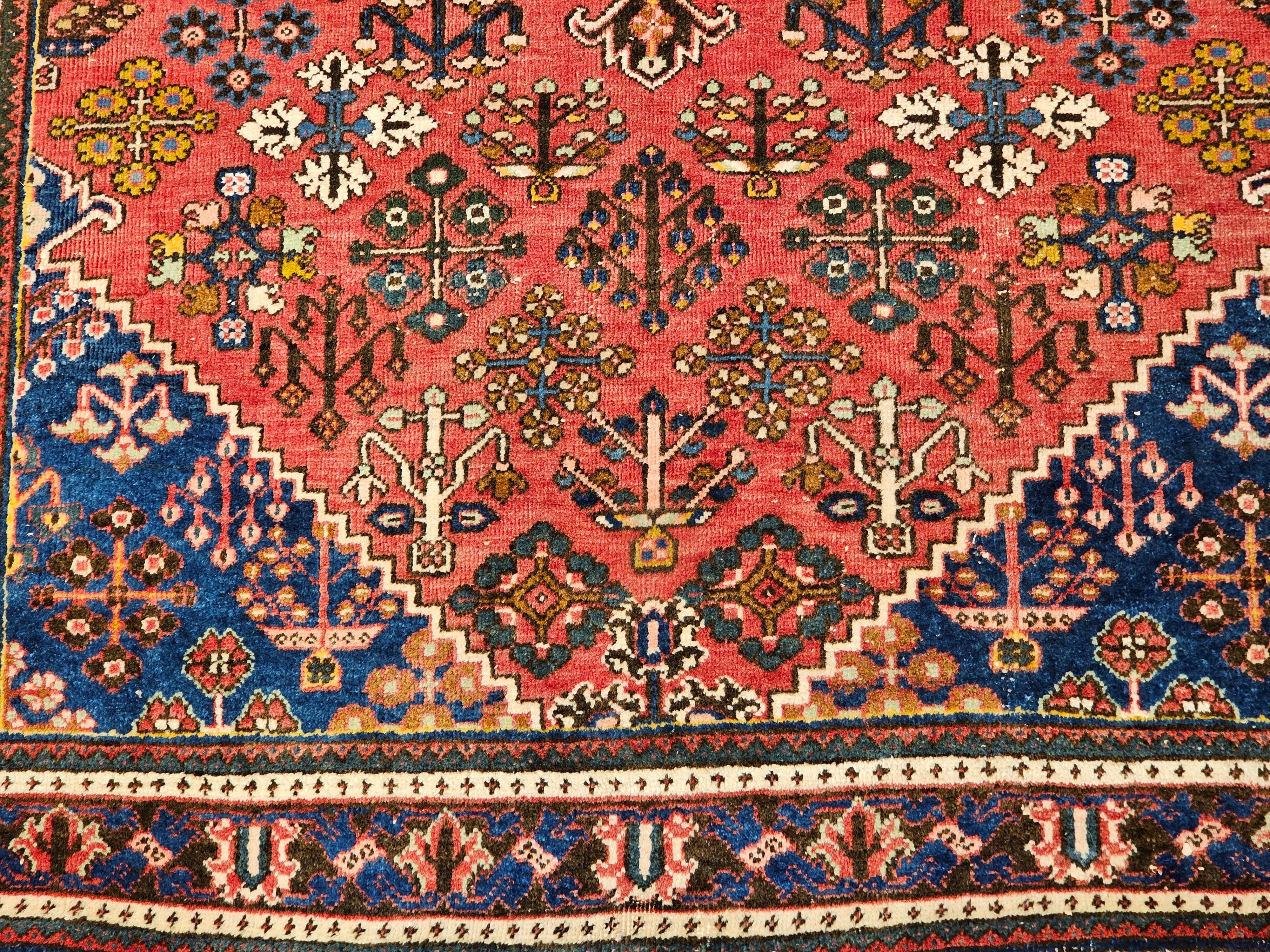 Hand-Woven Vintage Persian Joshaghan Rug in a Geometric Pattern in Rust Red, French Blue, G For Sale