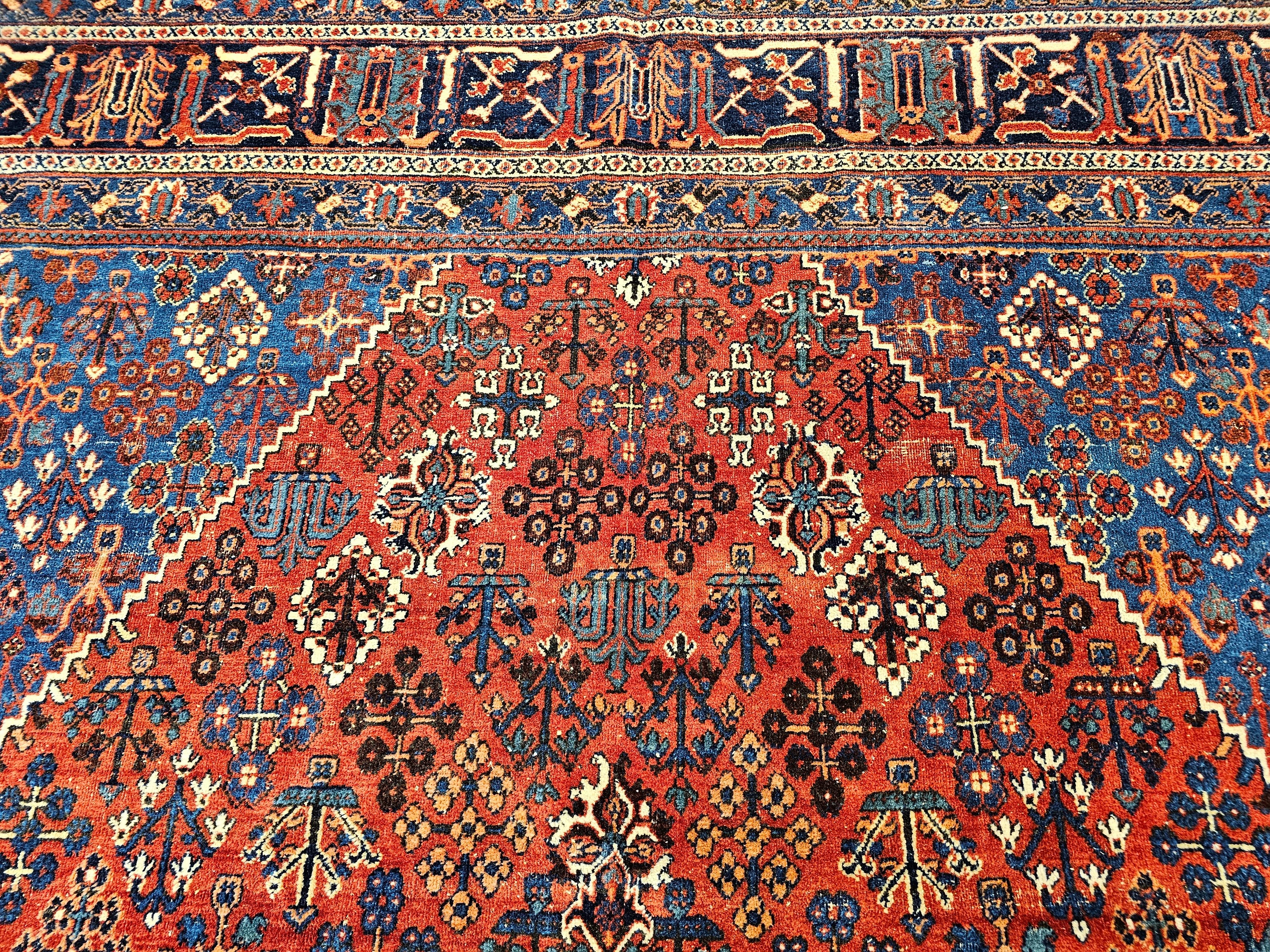 Hand-Woven Vintage Persian Joshegan Rug in a Geometric Pattern in Rust Red, French Blue For Sale